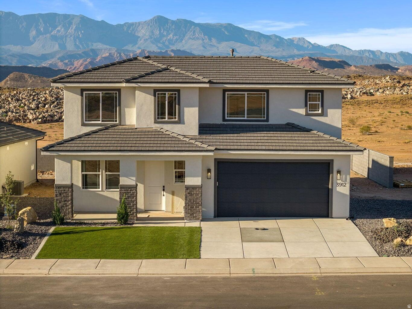 MOVE-IN READY!! This stunning new construction home by Holmes Homes features the highly sought-after Shale floor plan, offering the perfect blend of modern design and effortless desert living. Boasting 4 spacious bedrooms and 3 bathrooms, this thoughtfully designed home showcases open-concept living, ideal for both entertaining and everyday comfort. The stylish kitchen flows seamlessly into the main living space, complemented by contemporary finishes and abundant natural light throughout. A 2-car garage adds convenience and functionality. Located in the scenic Sand Hollow area within the desirable Legacy at Sand Hollow community, this home places you just minutes from Sand Hollow Reservoir, sand dunes, and world-class golf, delivering the ultimate Southern Utah lifestyle. Whether you're looking for a full-time residence, second home, or low-maintenance retreat, this property checks every box.