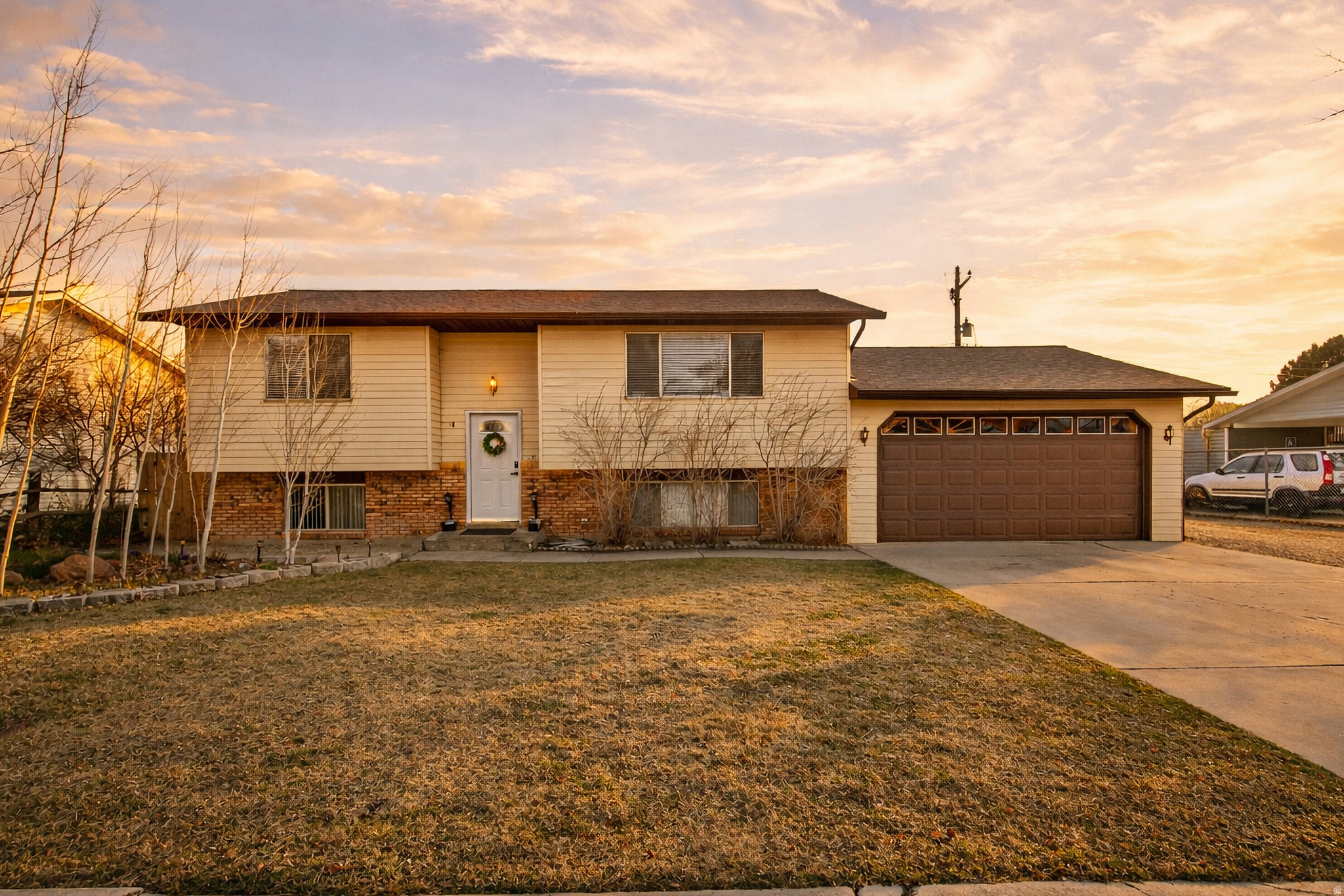 New Price! Move-in ready with fresh paint and new flooring, this 4-bed, 2-bath home is perfectly tucked on a quiet dead-end street in a highly sought-after area of American Fork. Enjoy a peaceful, low-traffic setting while being just minutes from top schools, shopping, dining, and world-class recreation in American Fork Canyon. The versatile layout features a massive basement flex room, currently utilized as a sprawling primary suite-perfect for a huge bedroom, home theater, or game room! The spacious kitchen flows seamlessly onto the back deck, ideal for summer BBQs and indoor-outdoor living. Outside, you'll find a fantastic, fully fenced backyard complete with an automated sprinkler system for easy maintenance. Finished with an oversized 2-car garage providing ample storage, this turn-key property checks every box and is an incredible find under $550K
