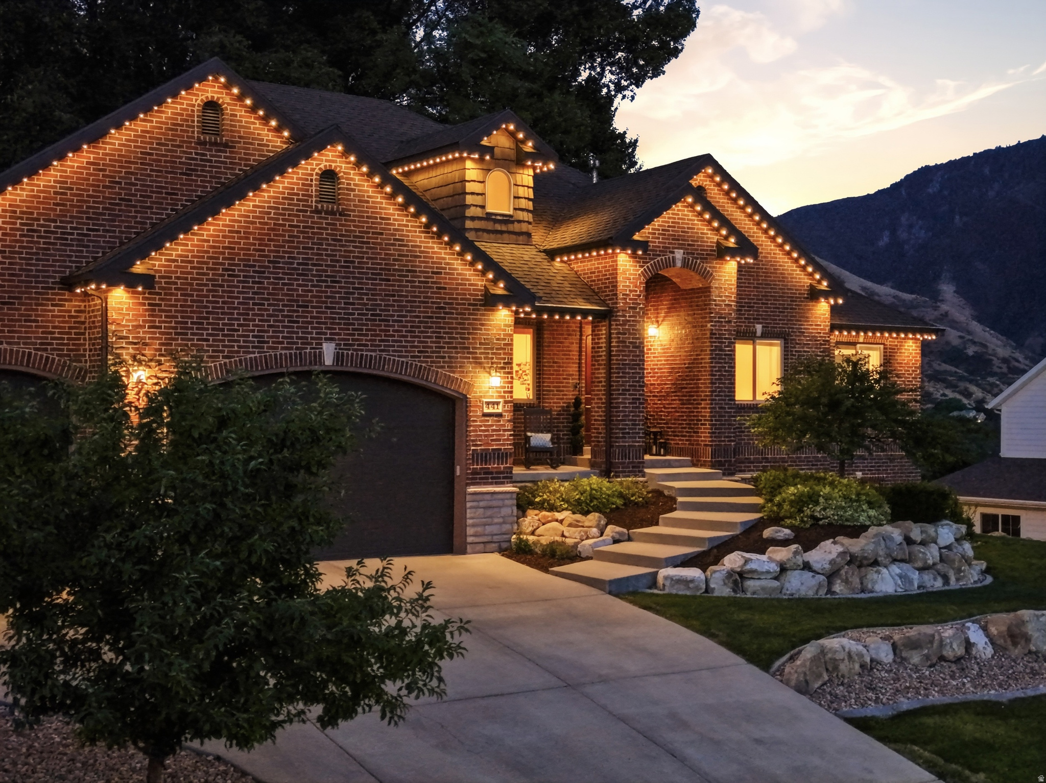 ***Please check out 3-D Home Tour*** Tucked away in one of Springville's most sought-after Cherrington Heights neighborhoods, this beautifully updated home sits on an exceptional .46-acre lot backing directly to the mountains, with private access to biking and hiking trails right out your back door. Towering mature trees, breathtaking mountain and valley views, and a peaceful backyard create a truly one-of-a-kind setting.  Inside, the open-concept floor plan is filled with natural light and features an oversized refrigerator and freezer, a functional mudroom with built-in lockers, a main-level primary suite, additional private suites upstairs and in the basement, and a theater room. Enjoy entertaining under the expansive covered patio or relaxing in your own backyard retreat.  Additional highlights include a separate basement entrance, oversized garage, new carpet, new blinds, a high-efficiency thermal envelope for lower utility costs, and a furnace and A/C replaced just two years ago.  Homes in Cherrington Heights rarely come on the market. Just minutes from Cherry Ridge Bike Park, Hobble Creek Canyon, top-rated schools, shopping, and dining, this home offers an unmatched combination of privacy, views, direct trail access, and convenience.  Square footage figures are provided as a courtesy estimate only and were obtained from county records. Buyer is advised to obtain an independent measurement.
