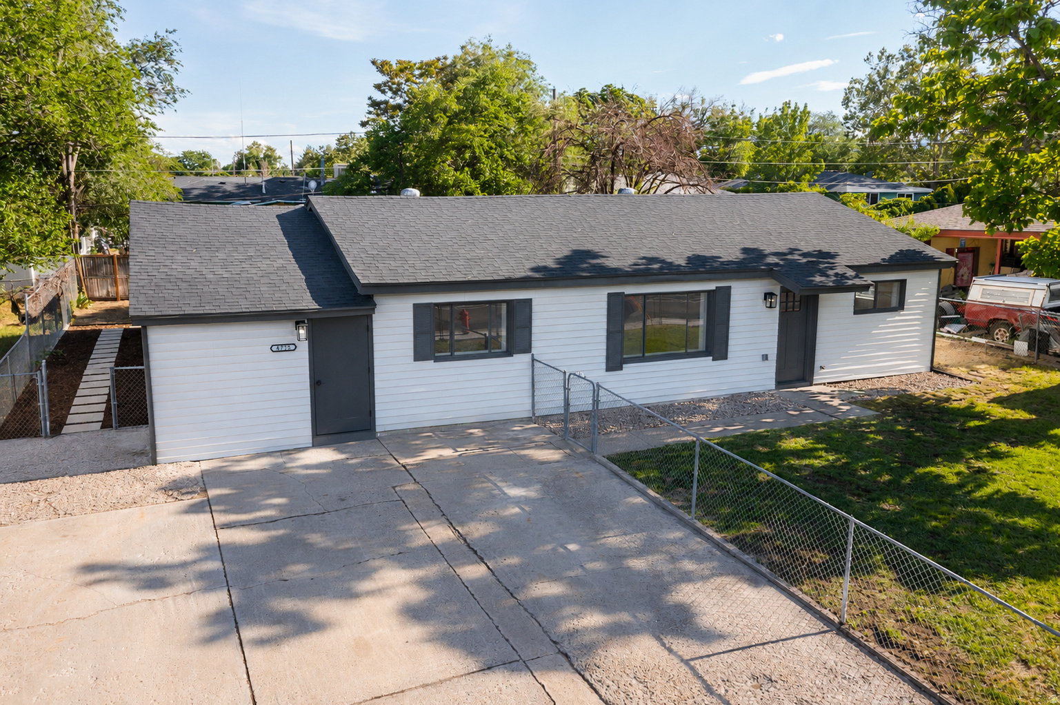 LEGAL DUPLEX in Kearns - completely remodeled inside and out with modern finishes throughout! Rare investment opportunity or house-hacking setup: live in one unit and rent the other, or rent both for serious cash flow. Front unit: 3 bedrooms, 1 full bath, brand-new kitchen with all-new appliances, new LVP flooring, fresh paint, and a spacious dining room with room for a closet/pantry. Estimated rental value: $1,800$2,100/month. Back unit: Private suite with its own entrance - 1 bedroom,  bath, and bonus office/flex room. Ideal for a tenant, in-laws, or home office. Estimated rental value: $1,200/month. Brand-new remodeled duplex with strong cash flow potential or a dramatically reduced mortgage payment for an owner-occupant. Minutes from the Utah Olympic Oval, USANA Amphitheater, Mountain View Corridor, and all of Salt Lake Valley. Square footage figures are provided as a courtesy estimate only and were obtained from independent measurements. Buyer is advised to obtain an independent measurement and verify legal duplex/zoning status.