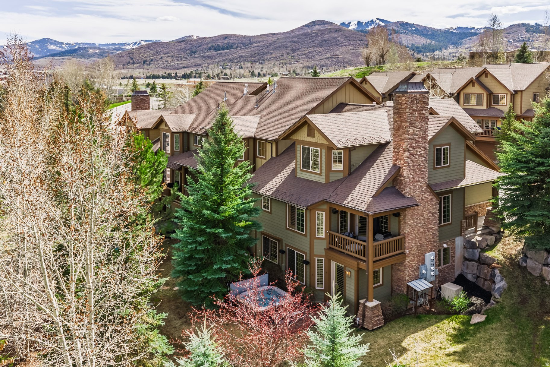 Discover this exceptional 3-bedroom, 3.5-bath Canyon Links townhome featuring one of the community's most desirable downhill floor plans, along with a deck overlooking the golf course and private jacuzzi  for gatherings and outdoor enjoyment. Perfectly positioned in Park City, this home offers quick and convenient access to Salt Lake City, Park City Mountain Resort, Deer Valley, and Salt Lake City International Airport. This move-in-ready property is part of a lively neighborhood with amenities including pickleball and tennis courts, and is just minutes from top-tier dining, shopping, golf, and year-round recreation. Canyons Village is only about 12 minutes away, while downtown Salt Lake City can be reached in roughly 20 minutes. Inside, the main level is bright and inviting, featuring an open-concept great room that connects effortlessly to a north-facing deck--perfect for outdoor dining or relaxing evenings. Upstairs, you'll find a spacious primary suite, a second en-suite bedroom, and a conveniently located laundry area. The lower level adds versatility with a third bedroom, a three-quarter bath, and a large secondary living area that opens to a private, tree-lined patio--offering a quiet space to unwind or entertain. Homes like this don't come on the market often--schedule your private showing today.