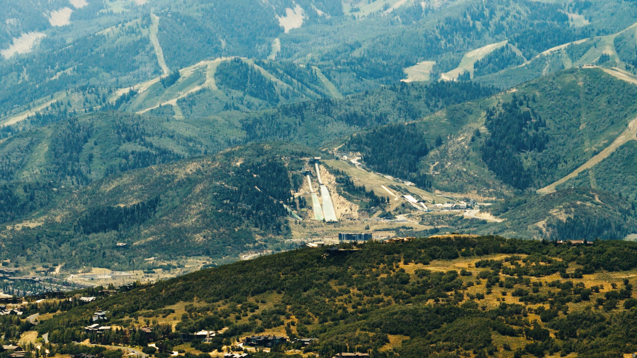 Build your legacy estate in the private, gated community of Stagecoach Estates. This rare 19.73-acre double-lot homesite (Lots 56 & 56A) offers exceptional privacy, multiple premier building sites, and sweeping Wasatch Mountain views-just 15 minutes from Park City's world-class skiing, dining, and recreation.  The gently sloped terrain provides excellent sun exposure and stunning view corridors, ideal for a custom mountain retreat designed to capture alpenglow sunsets and expansive alpine vistas. Boundary survey, slope study, and conceptual architectural renderings are complete, giving you a valuable head start.  Power and water are available nearby; private septic required. Year-round access on maintained roads within a secure gated enclave.  A rare opportunity to own nearly 20 acres of pristine mountain land with space, views, and proximity to everything Park City offers.  Square footage figures are provided as a courtesy estimate only and were obtained from county records. Buyer is advised to obtain an independent measurement.