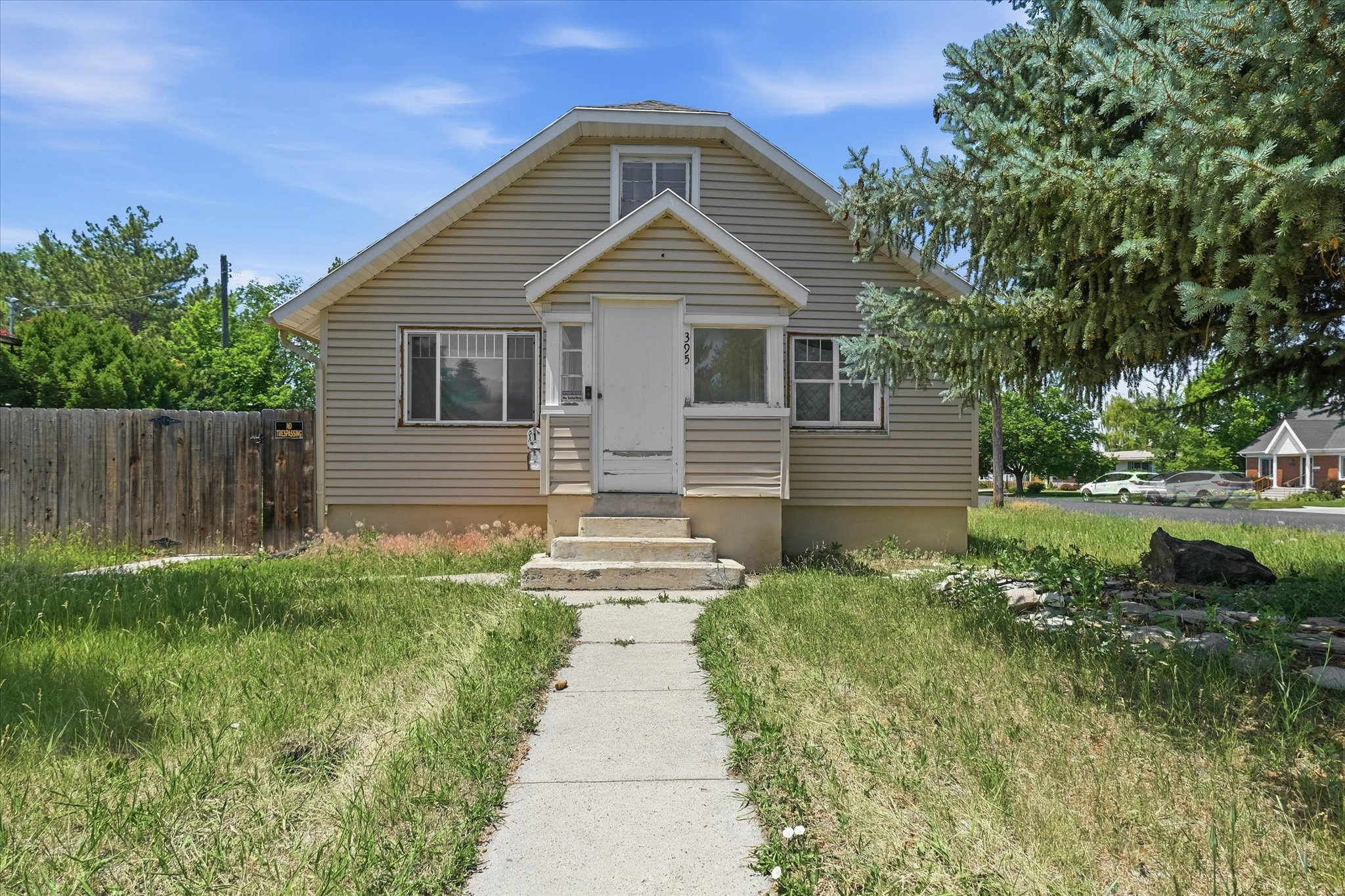 This is a solid opportunity for the right buyer who sees potential in cosmetic updates and value-add projects. The home has good bones and a practical layout that already includes a basement apartment - ideal for rental income, a private guest setup, or flexible living space. Out back sits a massive shop that can easily fit four cars, giving you serious workspace, storage, or room for projects that most properties just don't offer. Yes, it needs work. The kitchen is ready for an update, flooring refreshes would make a big difference throughout, and the yard could use some attention to boost curb appeal. But that's exactly where the opportunity sits. The heavy structural lifting is already done, and with some strategic updates this property has clear room to grow in value. Priced to reflect the work needed, it's a strong sweat-equity play for investors or handy buyers looking to build equity quickly. If you're in the market for a project with built-in income potential and a shop that actually delivers usable space, come take a look and picture what it could become after some updates.