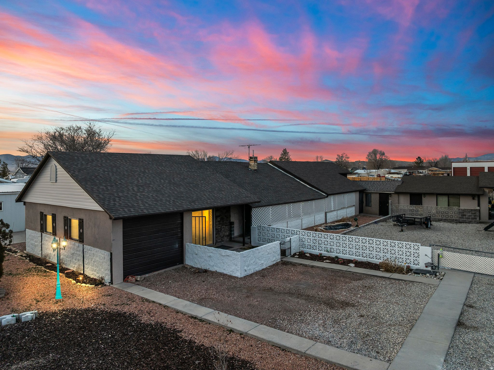 This home has a ton of features that you can"t find in other homes. The home has an attached apartment, so you can live in it and rent out the other side, use it as a vacation rental or if you can use it to live with family members. The property has a beautiful no maintenance yard, with plenty of room for parking. The house is including the gym and equipment. The home has been fully renovated and is move in ready.