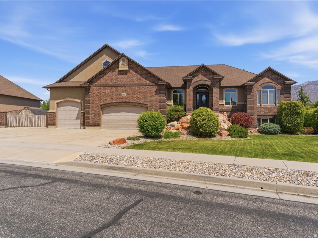 Parade of Homes Custom Built. Upgrades galore. Completely landscaped, fully fenced yard, 4 car  heated garage (3rd car goes through), Huge 40 x 40 detached shop to store all of your toys.  Covered deck, private patio, 2nd kitchen in walkout basement.  This home wants you to buy it and the sellers also want to make this happen. AMAZING Farr West home. Most everything in the home has been custom built. From the incredible kitchen to the crafted wood on the walls and floors. Home offers 4251 sq ft of spacious living, thoughtfully designed to provide a seamless flow perfect for entertaining. Located on a large .42 acre lot, this home combines modern upgrades with timeless charm.*** The updated kitchen features a gas range, custom Granite countertops, and ample storage-ideal for both cooking and hosting.    Seller would like to leave the pool table in basement for new owner.   Also available is the Canopy bed set in the Primary bedroom.  Step outside into the beautiful backyard patio area, where it is privately inviting and comfortable and also wired for a hot tub!  Garden lights throughout the backyard set on timers along with a 'Smart" watering system that will conserve water during stormy days.  Conveniently located,  this home offers the perfect blend of comfort and style. Don't miss your chance to own this stunning home. Measurement were provided from county records.