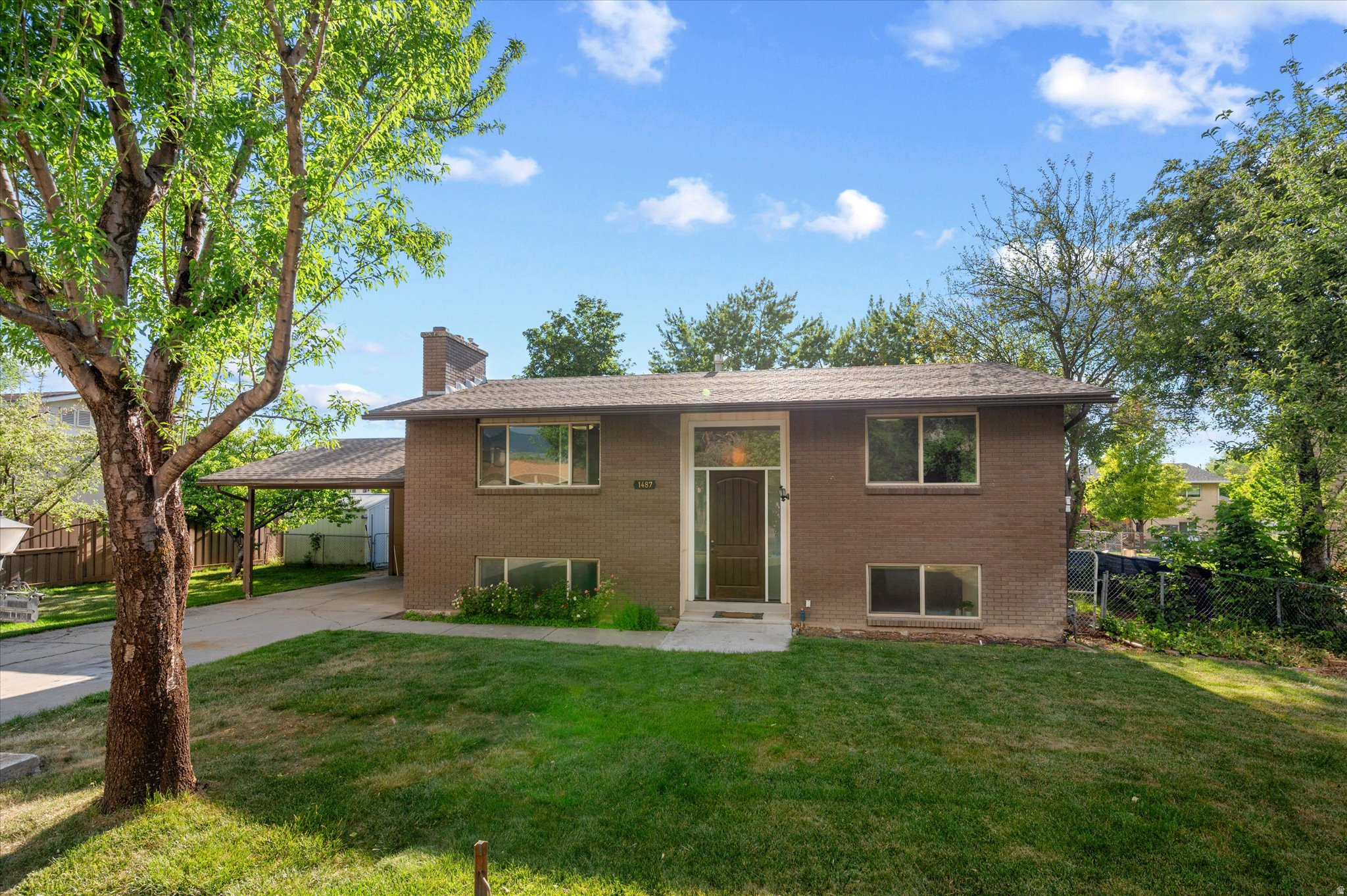 Charming West Bountiful home in a lovely quiet neighborhood with convenient access to Legacy Parkway and I-15! Close to parks, schools, shopping, and dining while still offering a peaceful tucked-away feel. Clean, well cared for, and full of potential with fresh paint and carpet, two fireplaces, and a large yard with mature fruit trees. The walk-out basement entrance leads to an oversized laundry and storage area with future second kitchen potential. A warm and lovable home in a fantastic location! Square footage figures are provided as a courtesy estimate only and were obtained from County Records .  Buyer is advised to obtain an independent measurement.