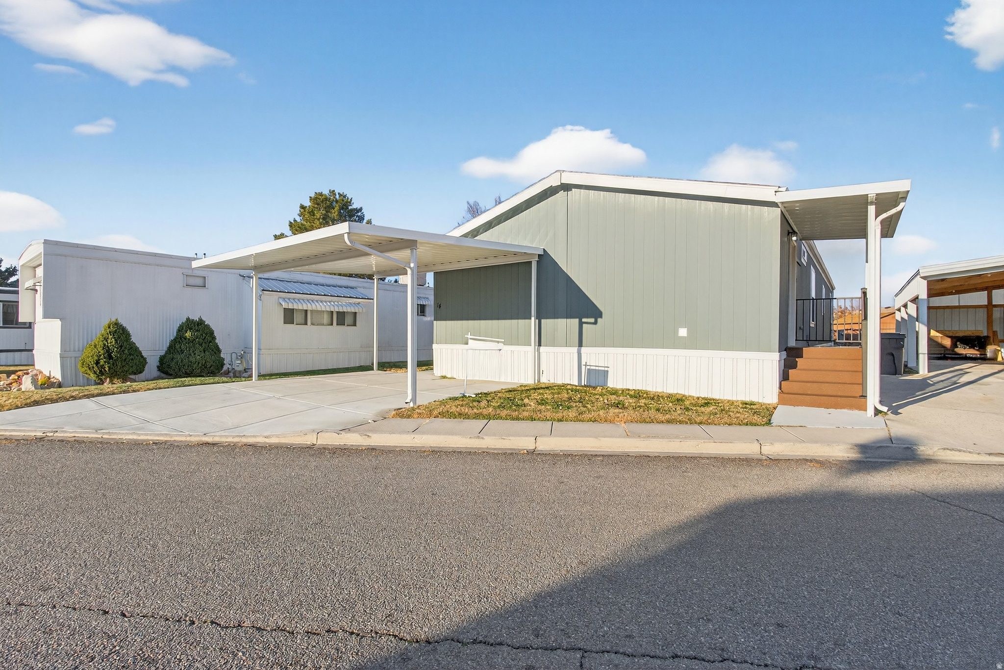 Beautiful 3-bedroom, 2-bath manufactured home in the brand new Wasatch Ranch Community in Pleasant View. This home features fresh interior finishes, LVP flooring, a spacious living room, and a stunning kitchen with upgraded cabinetry and stainless steel appliances. The primary suite includes a walk-in closet and double-sink vanity, with three additional bedrooms offering great flexibility. Enjoy a large private deck, covered parking, and a move-in-ready feel throughout. Carport, awnings, and xeriscaping are all included, saving the buyer additional expense and making this home truly 100% move-in ready. Wasatch Ranch will offer brand-new amenities and an affordable, modern community in a highly desirable location.   Square footage figures are provided as a courtesy estimate only and were obtained from model description. Buyer is advised to obtain an independent measurement.