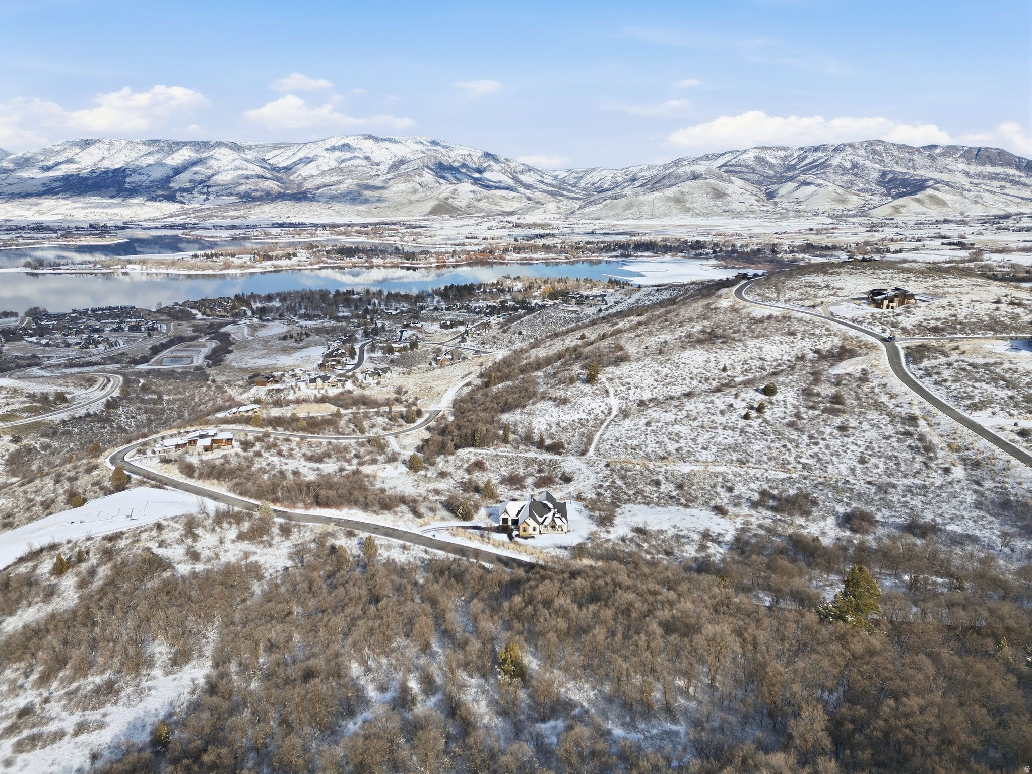 Hawkins Creek Gated Homesite, Nature-Wrapped Privacy, Custom Build Ready. Escape to a quieter kind of luxury. In the gated Hawkins Creek community, this tree-filled homesite delivers privacy first, open space at the boundary, and a peaceful mountain backdrop for a custom build designed around nature. With the geo study completed, you can focus on planning the home that fits your vision. Set just off Old Snowbasin Road, enjoy quick access to Snowbasin, Pineview Reservoir boating, and endless trails for hiking, biking, and skiing. Hawkins Creek's covenants and architectural guidelines support a cohesive, nature-forward neighborhood that stays true to the valley. Buyer to verify all information, boundaries, and documents.