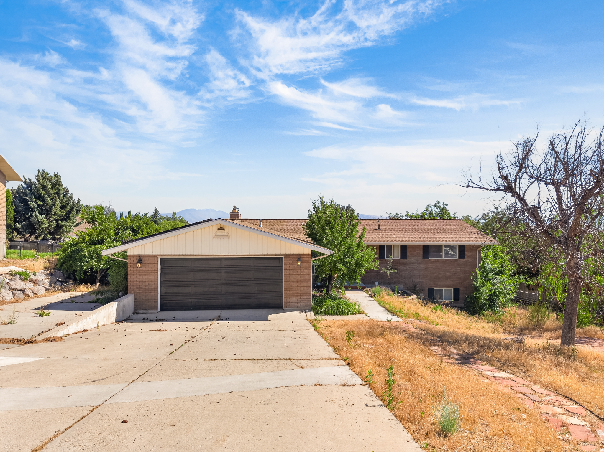 Some homes get updated. This one was reimagined! Set in the heart of Orem, close enough to I-15, shopping, and UVU to make errands effortless, yet quiet enough to feel like a retreat, this rambler sits just a short stroll from Nielsen Grove Park and the free UVU Museum of Art. The sellers didn't just patch things up over the years; they rebuilt the bones. A brand-new roof overhead. Solar panels, fully paid off. A new furnace and water heater humming quietly in the background-fresh flooring flowing underfoot from room to room. Step inside and the details keep unfolding: hand-finished archways framing the kitchen and entry, bathrooms rebuilt from the studs out, and walls wrapped in fresh paint that make every room feel new. One bedroom has been transformed into a walk-in closet worthy of its own real estate listing, though it's ready to flex back into a fourth bedroom whenever you need it. Downstairs, the basement is a blank canvas with big ambitions. Add a second kitchen, and you've got a built-in setup for multi-generational living, a rental suite, or whatever your household needs next. This isn't a house waiting for a to-do list. It's one that's already checked the boxes and left just enough open for you to add your own signature. Washer, Dryer, inside fridge, and garage fridge are INCLUDED. The house will be sold in 'AS IS' condition.
