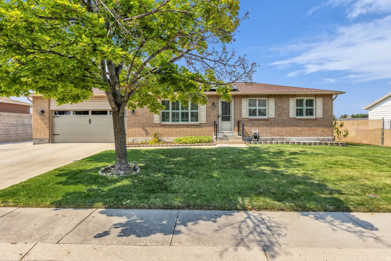 Welcome home to this Amazing West Jordan Rambler The sellers has lovingly maintained and updated this home, making it move in ready for its next owners. Recent improvements include fresh paint, beautiful laminate flooring, a newer furnace, tankless water heater, stainless steel appliances, a newer roof with solar panels, and elegant plantation shutters throughout. Step outside and enjoy the covered patio complete with a hot tub perfect for relaxing evenings year round. Additional highlights include a durable cinder block shed for extra storage and a Children's playhouse for all those afternoon Tea Parties don't forget the oversized garage with plenty of room for vehicles, tools, and hobbies. This exceptional home offers comfort, efficiency, and space, making it a must see property!