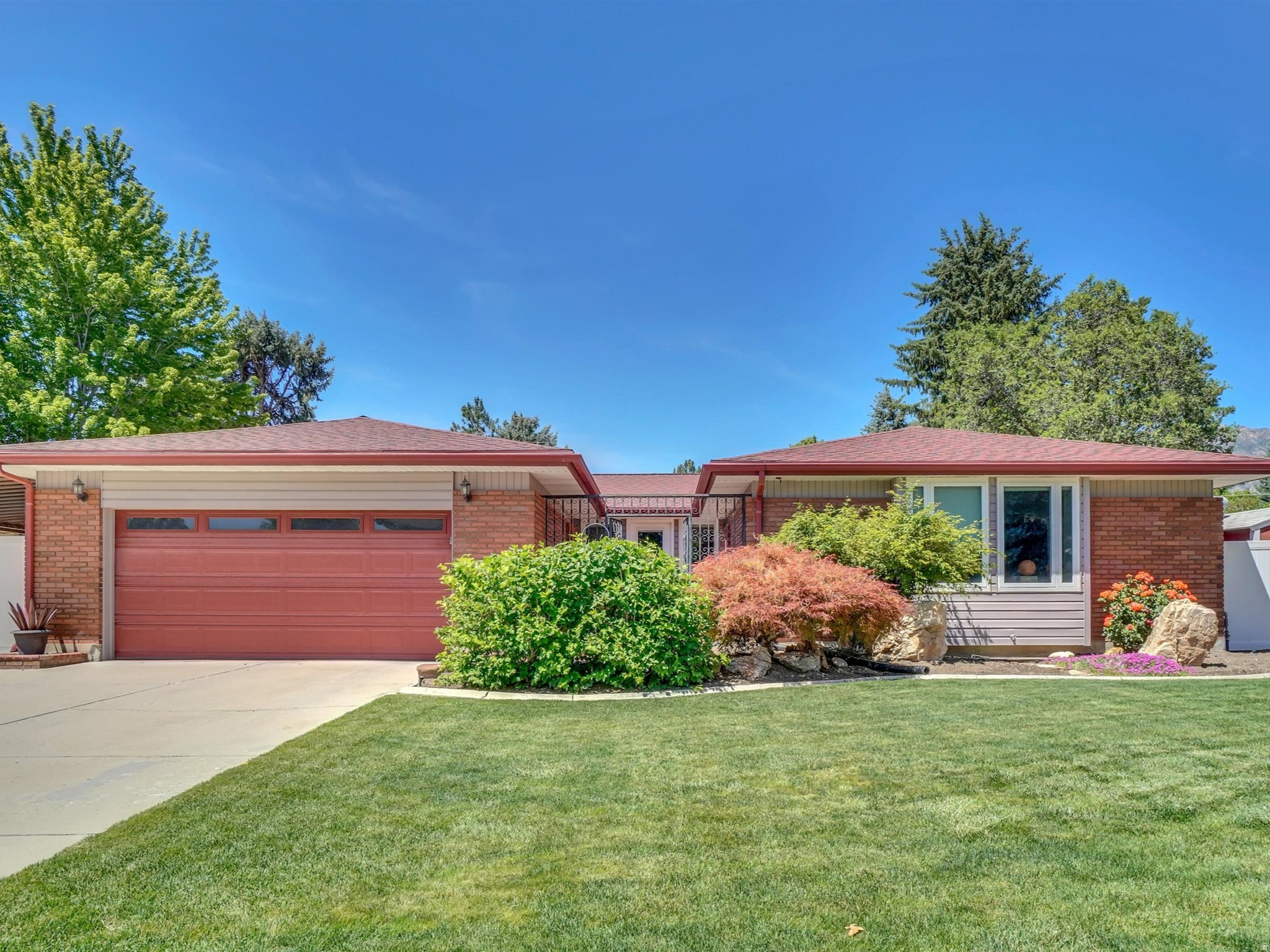 Welcome to 2505 Robidoux Road. This beautifully updated and fully remodeled brick rambler sits adjacent to the Willow Creek Country Club , beautiful setting in a highly desirable neighborhood. Tastefully updated including honed granite countertops, engineered hardwood flooring, white shaker cabinetry, high-end stainless-Steel appliances with dual fuel gas oven, 4 burner cooktop with griddle. Primary suite has been redesigned with dual sinks, large walk-in closet with barn doors, and huge shower.   Enjoy entertaining guests on a full length, covered deck, shady afternoon BBQ, large backyard with putting green and two chipping areas. Basement includes a separate entrance, perfect to accommodate multi-generational living or convert to a mother-in-law apartment/ADU. wet bar, 2 bedrooms and large family room with fireplace. Also, relax in the basement sauna after putting and chipping practice! Storage sheds and pool table included! Extra-large driveway could accommodate RV parking, additional home parking areas. Ideally located a few minutes to the Cottonwood Canyons to enjoy world class skiing, hiking biking. Easy access to shopping, dining, freeways and excellent schools. Square footage figures are provided as a courtesy estimate only and were obtained from County Records   Buyer is advised to obtain an independent measurement.