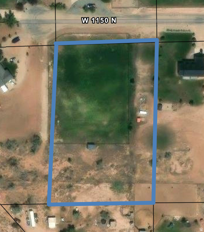 Rare 2.52-Acre Building Lot with Irrigated Pasture in the coveted  Caroline Estates Subdivision. Discover the perfect blend of country living and convenience in Hancock Cove. This beautiful 2.52-acre lot offers Mountain views, usable pasture, Pipe fence, with panels, and room to create your dream property.  Culinary Water is connected and meter set, Power is nearby. Water Rights Include 1 share of Dry Gulch water with a wheel line.  This lot is ideal for horses, livestock, or hobby farming and is Situated in one of the area's most desirable location.  Features include  wide-open skies, stunning views, and easy access to town.  The lot provides ENDLESS POTENTIAL and is perfect for a custom home, mini ranch, or peaceful retreat. Septic was verified in 2023, but will have to be re-certified, Subdivision was approved by Duchesne, County. There is a Lean-to connected to the fence on the property.