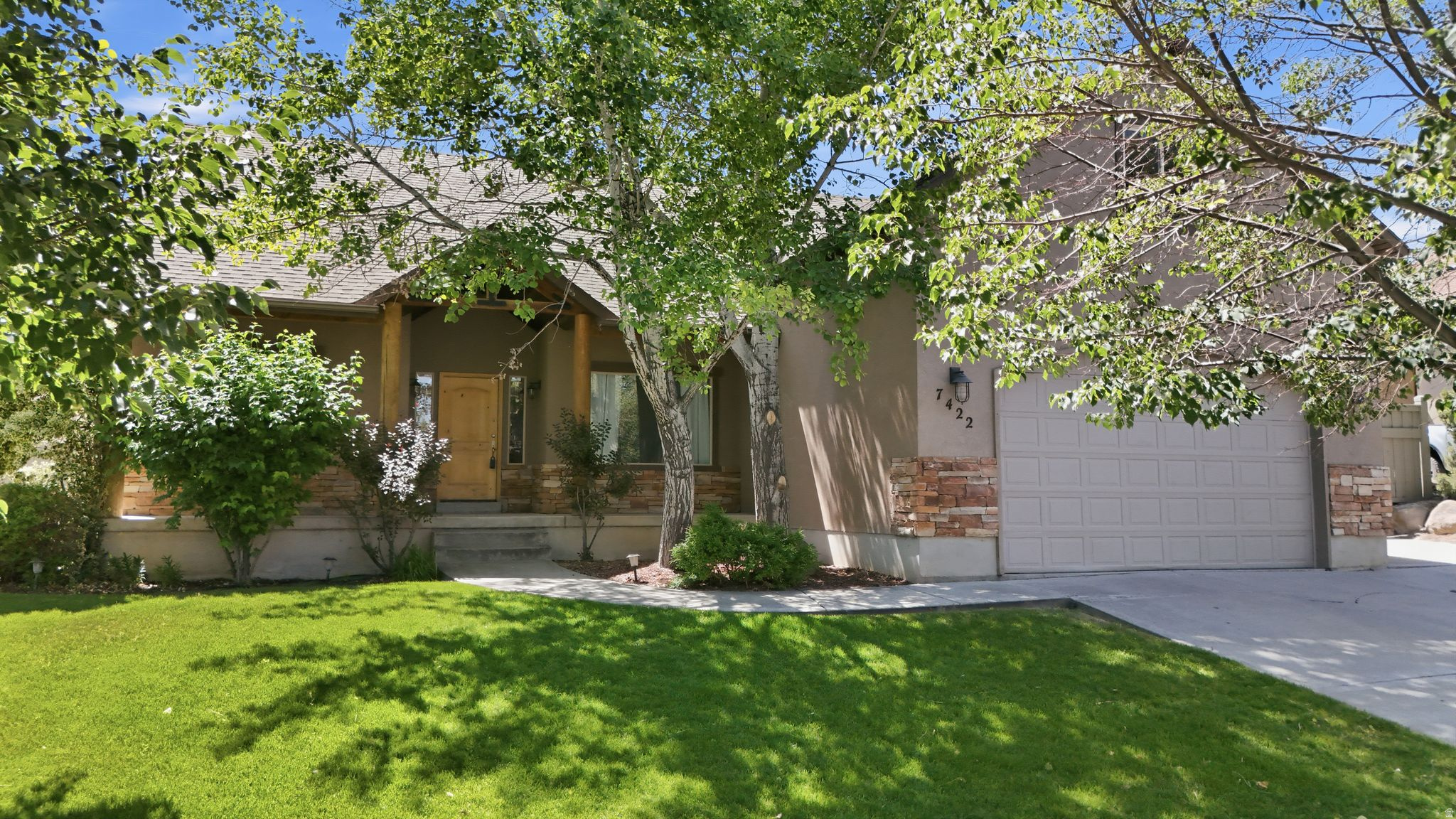Welcome to this beautiful single family home in Eagle Mountain! Located on a quiet street with no back door neighbors, this home features main floor living with a spacious primary bedroom with fireplace, separate tub shower and walk-in closet, laundry and two additional bedrooms! The basement is spacious and perfect for entertaining with a large family room, additional bedrooms, a kitchenette, and a large storage room. Other features include quartz countertops, vaulted ceilings, a separate office and spacious office/den above the garage, and a water softener! The backyard is private and backs up to a mountain bike and hiking trail area with direct access and includes some raised garden boxes, a trampoline, a covered sand box and fire pit area, and a large RV pad! the Bullfrog spa is negotiable. Square footage figures are provided as a courtesy estimate only and were obtained from county records .  Buyer is advised to obtain an independent measurement.