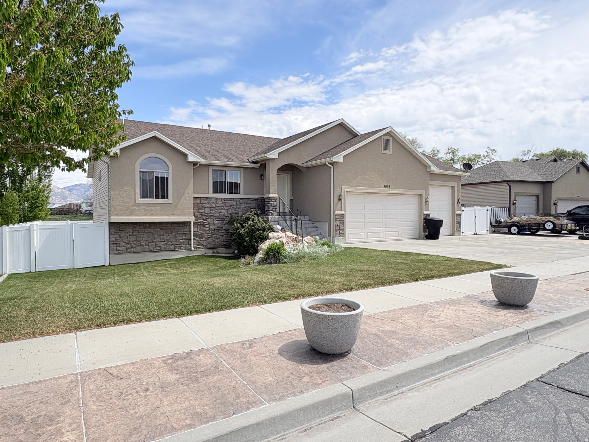 Space. Privacy. Function. Welcome to Plain City living at its finest. In Still Creek, a 3000+ sqft rambler offers no rear neighbors, a finished basement, RV parking, a 220v garage, solar efficiency, a 60x40 patio with quiet Utah living.