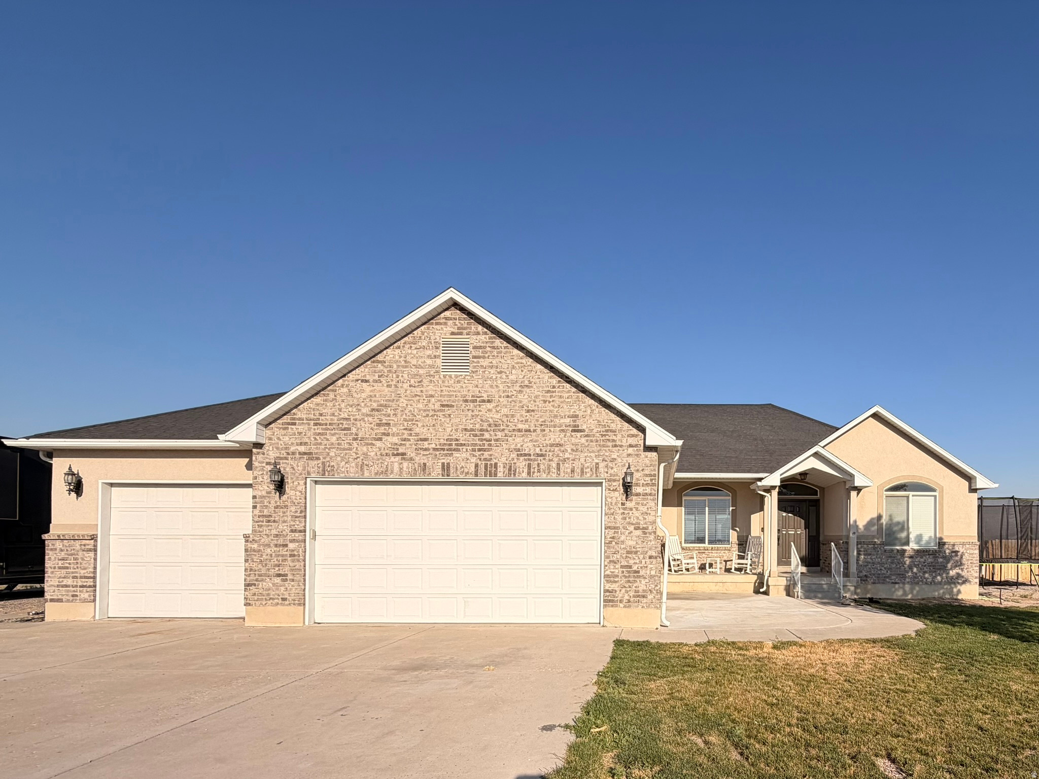 Single-level living on 6+ acres with room for animals and 1.776 AF of underground water rights. The home features an open floor plan, new carpet throughout, a new sprinkler system, a new water heater, and a variable-speed well pump. The movie room includes a mini-split heating and cooling system and was added within the garage space; it can easily be removed if you prefer to utilize all garage bays for parking and storage. The thermal-block glass sliding door provides access to the large Trex deck. Additional features include an above-ground pool, fenced backyard, and expansive deck overlooking the property, a fenced pasture with water lines ready for sprinklers.  A Conex container is included and provides excellent additional storage. Surrounded by farmland with unobstructed views.