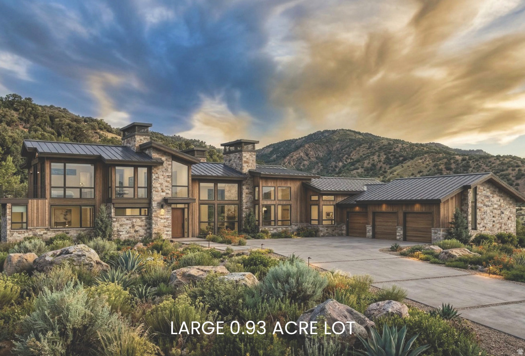 One of the most prestigious new builds in the stunning Golden Eagle neighborhood, this contemporary architectural masterpiece is underway on a prime corner lot. With walls of glass framing views of Mount Timpanogos, Deer Valley, and the shimmering Jordanelle below, every room showcases a gallery of nature's finest work.   Inside, high end finishes and an expansive open floor plan provide spaces where function meets luxury   - from floor-to-ceiling stone fireplaces to hand-selected tile and designer lighting that elevate each room. Outdoor patios surrounding the home help to welcome the gorgeous natural surroundings into everyday life.   The 1,000-square-foot primary suite occupies the entire upper level, offering a private sanctuary complete with panoramic vistas and a spa like bathroom suite. Three additional bedrooms with en-suite baths ensure space and comfort for family and guests alike.   An oversized three-car garage provides ample room for mountain toys and gear to embrace adventure, all just 10 minutes from the bustling Main Street and five star amenities of Park City and surrounding ski resorts! Low HOA fees of 1,776 per year offer casual living with the best views in Utah.   This is more than a home - it's a statement of mountain modern elegance, perfectly poised to start your next chapter here in Golden Eagle.