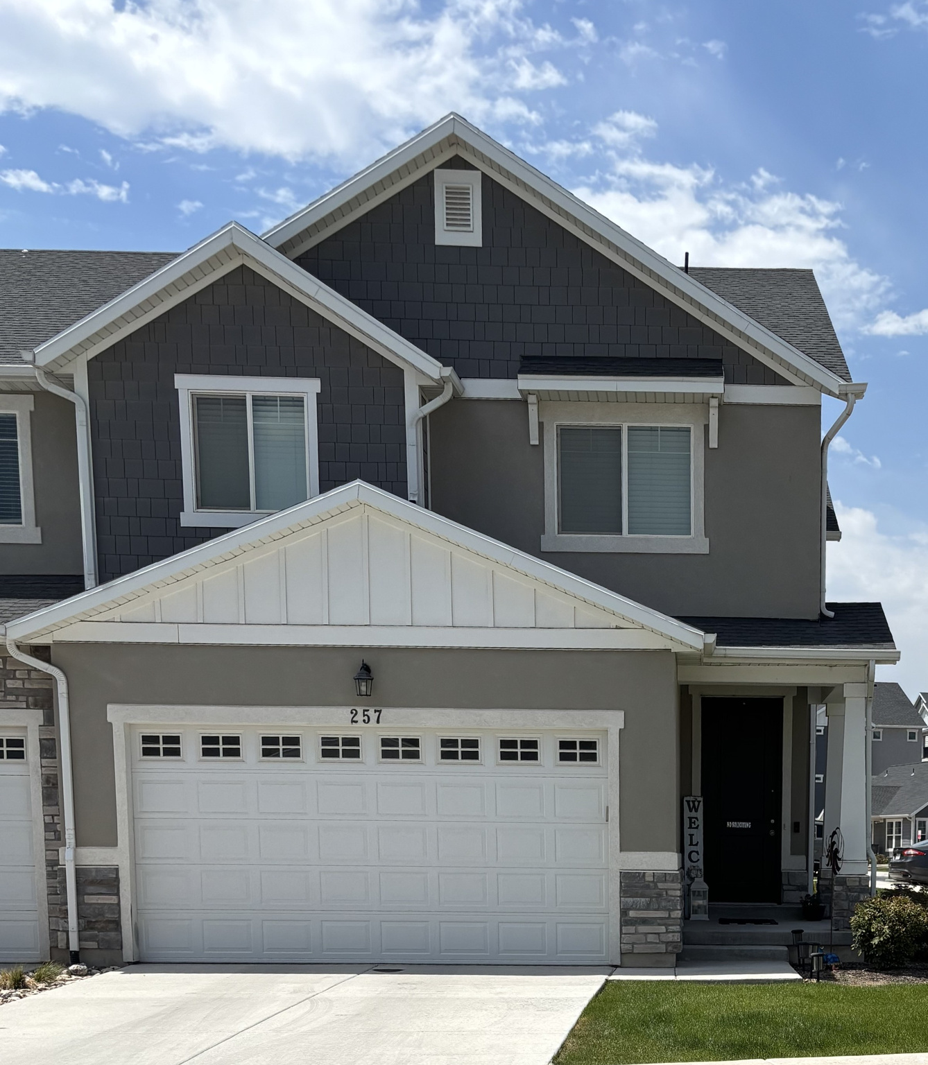 **Rare end-unit townhome with upgrades you won't find in most townhomes! **This like-new home has been immaculately maintained and offers an open, bright layout with soaring vaulted ceilings and 10 additional windows that fill the home with natural light. Cozy up around the built-in gas fireplace with a beautiful mantel-a rare and sought-after feature in townhome living. The spacious design combines modern finishes with exceptional care, making this home truly move-in ready. The unfinished basement offers the option for an additional bathroom, bedroom, family room, and storage!   Enjoy an unbeatable lifestyle with access to fantastic community amenities, including a clubhouse, swimming pool, walking trails, playground, pickleball courts, and a fully fenced dog park. Whether you're relaxing at home or enjoying everything the neighborhood has to offer, this exceptional end-unit is one you won't want to miss!