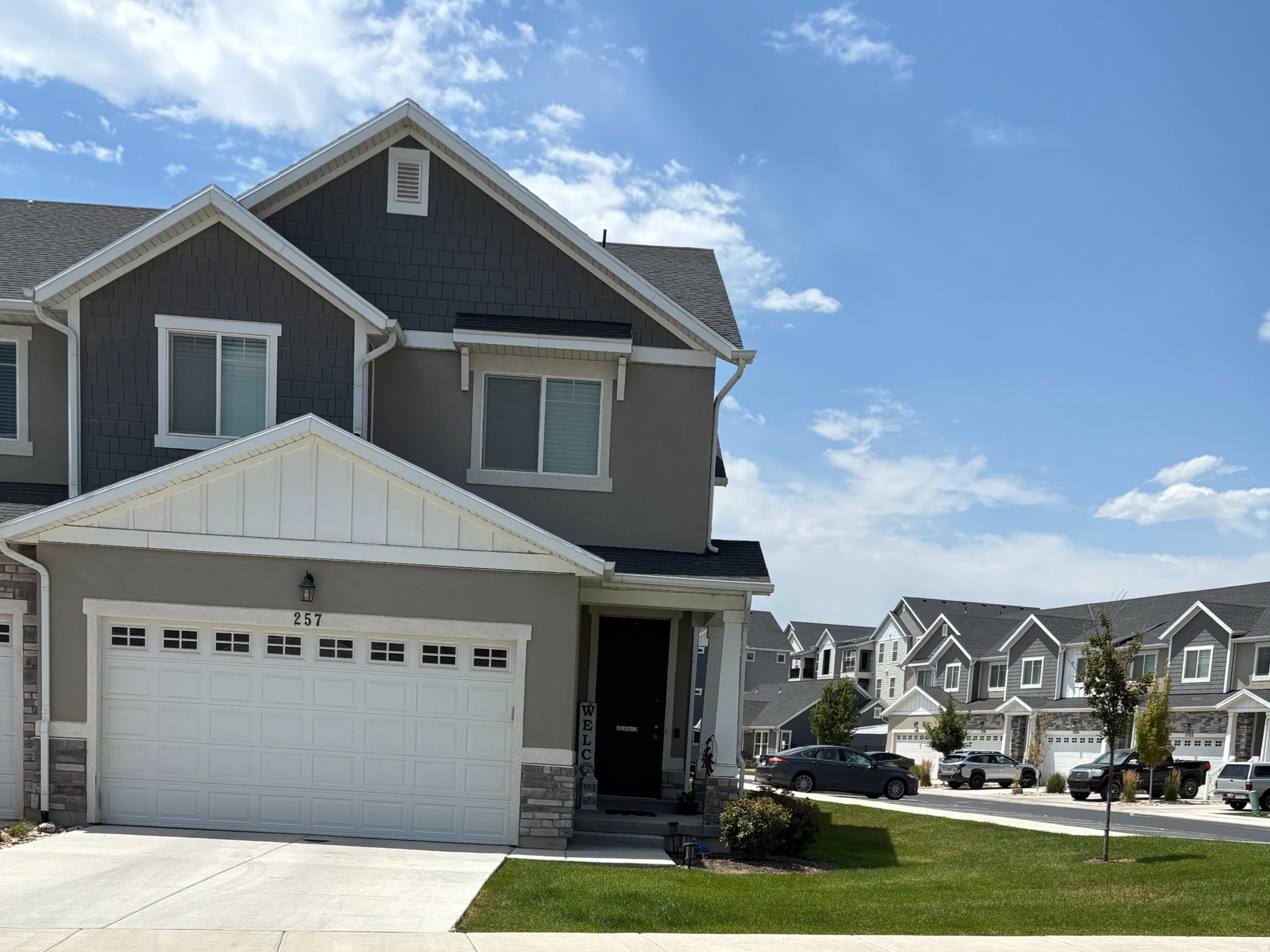 **Rare end-unit townhome with upgrades you won't find in most townhomes! **This like-new home has been immaculately maintained and offers an open, bright layout with soaring vaulted ceilings and 10 additional windows that fill the home with natural light. Cozy up around the built-in gas fireplace with a beautiful mantel-a rare and sought-after feature in townhome living. The spacious design combines modern finishes with exceptional care, making this home truly move-in ready. Enjoy an unbeatable lifestyle with access to fantastic community amenities, including a clubhouse, swimming pool, walking trails, playground, pickleball courts, and a fully fenced dog park. Whether you're relaxing at home or enjoying everything the neighborhood has to offer, this exceptional end-unit is one you won't want to miss!