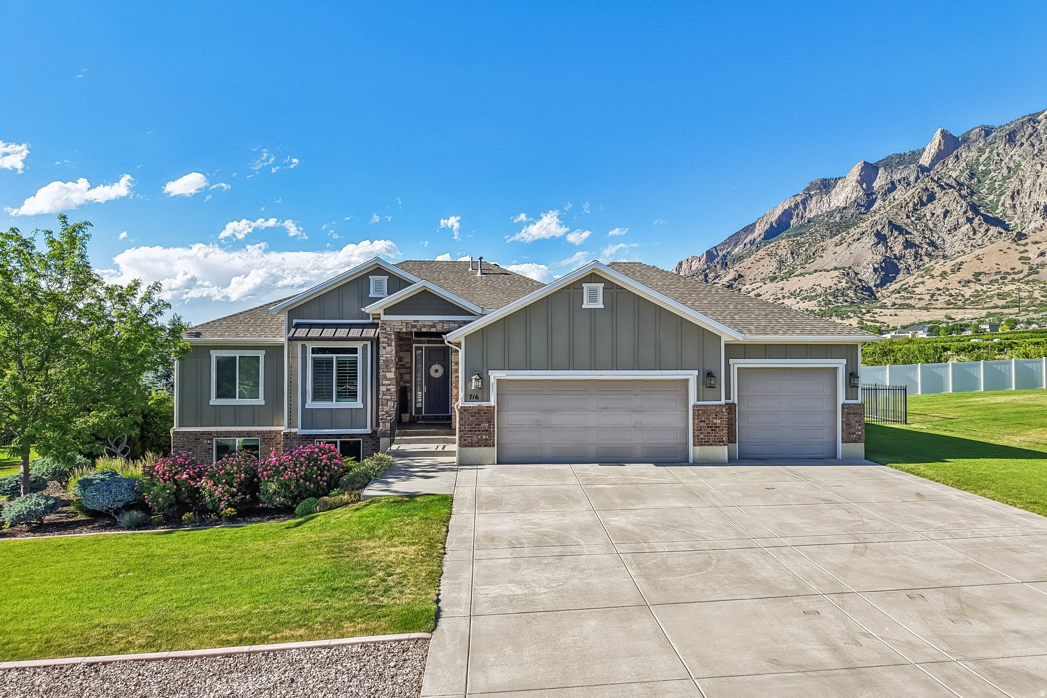 This 2014 Parade of Homes, winner of 4 awards, is IT! Meticulously maintained home has fully finished basement with kitchenette, providing separate living space, theater room with equipment included, central vac ready and large 3 car garage. A chef gourmet kitchen on the main level with Bosh appliances, a pot filler and large granite island. The award winning curb appeal stands out with mature tress, established landscaping, custom fencing and covered Trex deck. New roof in 2021. Enjoy glowing mountain views while relaxing in the built in, easy to maintain, Bullfrog hot tub. Enter the spacious primary suite offering new carpet and paint, walk in shower with double heads and heated ceramic plank flooring. Located just minutes from Weber County and I-15. Agent Owner. Square footage figures are provided as a courtesty estimate only. Buyer is advised to obtain an ibndependent measurement.
