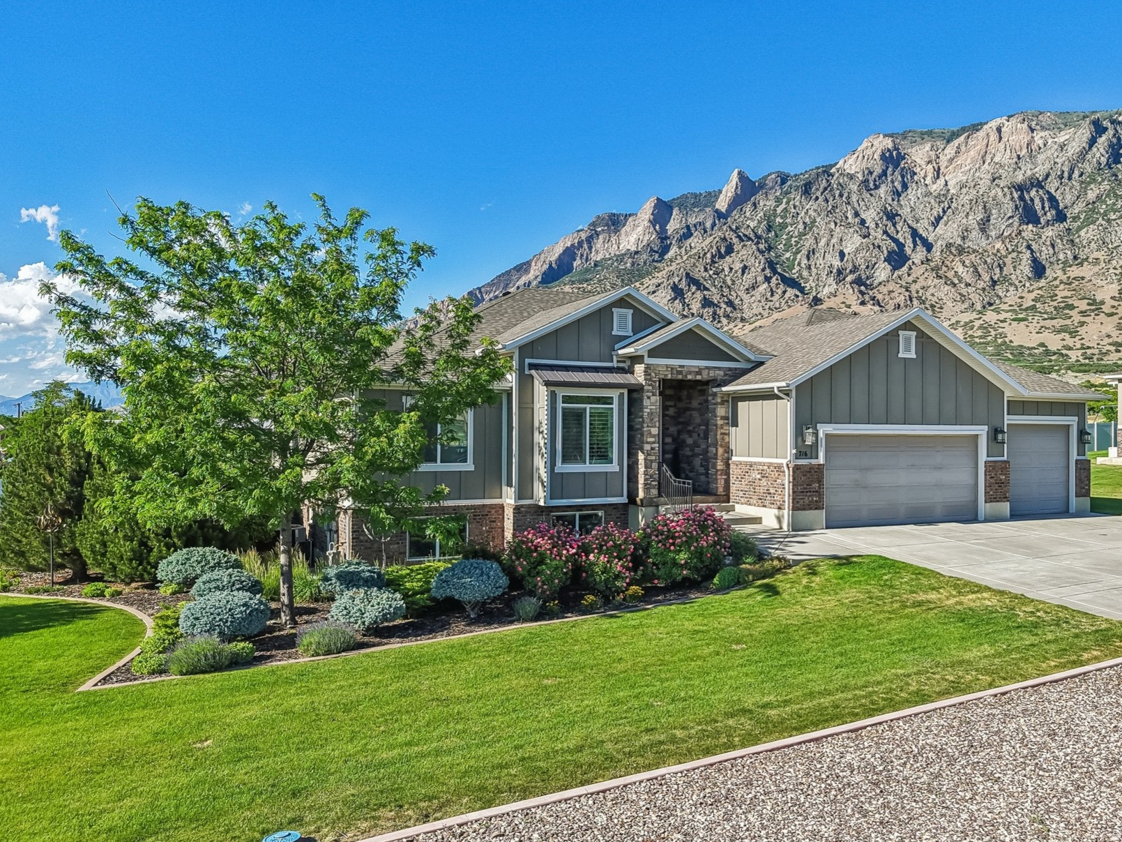This 2014 Parade of Homes, winner of 4 awards, has stunning mountain, lake and orchard views! Located on a quiet street on the east bench in South Willard.  This meticulously maintained custom home has a chef gourmet kitchen with Bosh appliances, a pot filler and large granite island, primary suite offers new carpet and paint, large walk in shower with double heads, heated ceramic plank flooring. A fully finished, walk out basement with kitchenette, two bedrooms and full bath, enjoy a large theater room with equipment included. Large 3 car garage with work bench and mezzanine. Award winning curb appeal stands out with mature trees, established landscaping, custom fencing and covered Trex deck. New roof in 2021. Enjoy glowing mountain views while relaxing in the built in, easy to maintain, Bullfrog hot tub.  Agent Owner. Square footage figures are provided as a courtesy estimate only. Buyer is advised to obtain an independent measurement.
