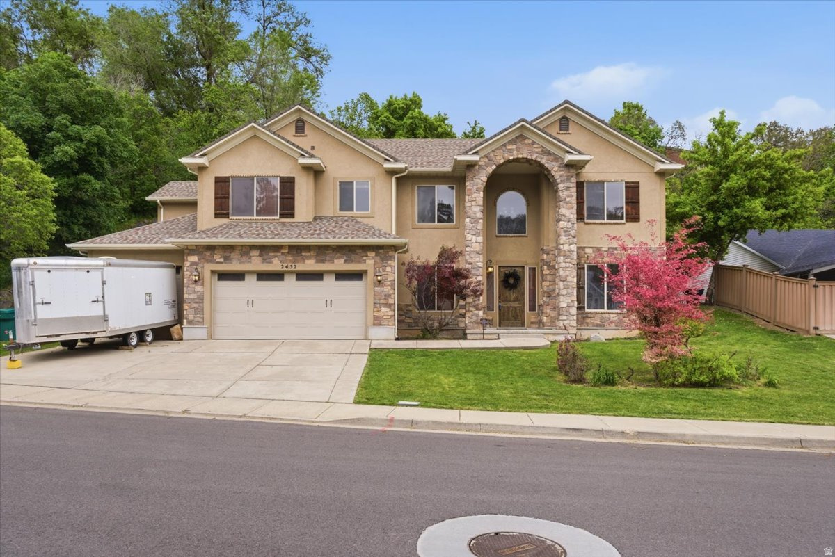 This stunning home features a unique floor plan in the highly desirable Kays Creek neighborhood! From the moment you walk in, you'll love the open feel and beautiful finishes throughout.  With 4 bedrooms and 3 bathrooms, this home offers plenty of space for comfortable living and entertaining. The soaring 9' and 10' ceilings create a bright and spacious feel, while the hand-scraped wood floors add warmth and character. The kitchen is a standout with gorgeous stained cherry cabinets, granite countertops, and quality details throughout.  The layout is perfect for everyday living, family gatherings, or hosting friends. Step outside and enjoy your own private backyard-an ideal place for relaxing, summer BBQs, or enjoying a quiet evening after a long day.  Located in one of the area's most sought-after neighborhoods, this home combines style, comfort, and a fantastic location. Homes like this don't come around often-come see all it has to offer!
