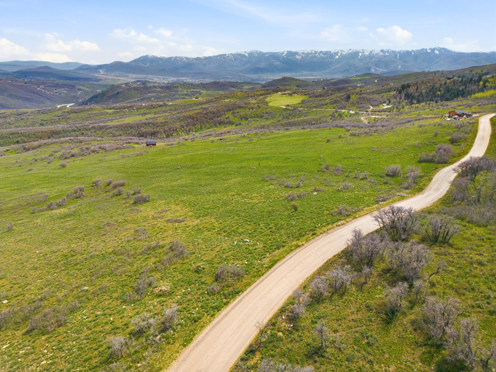 Located in the Forest Meadows community in Tollgate Canyon, this expansive 9.74 acre property boasts easy year round access with stunning panoramic views of the Wasatch Mountains and valleys below. If you have been looking for your piece of big sky country, this is it! This property features plenty of relatively flat terrain for building your dream mountain oasis, as well as scrub oaks that are inviting for the local deer, elk, and moose. This property is a nature lover's dream come true! Tollgate Canyon allows residents to live close enough to Park City to take advantage of world class powder days but still live a peaceful mountain lifestyle. Even better, the Salt Lake Valley is a quick commute down I-80, making Tollgate a favorite retreat for those looking to escape city life. With so much acreage, let your imagination run wild!
