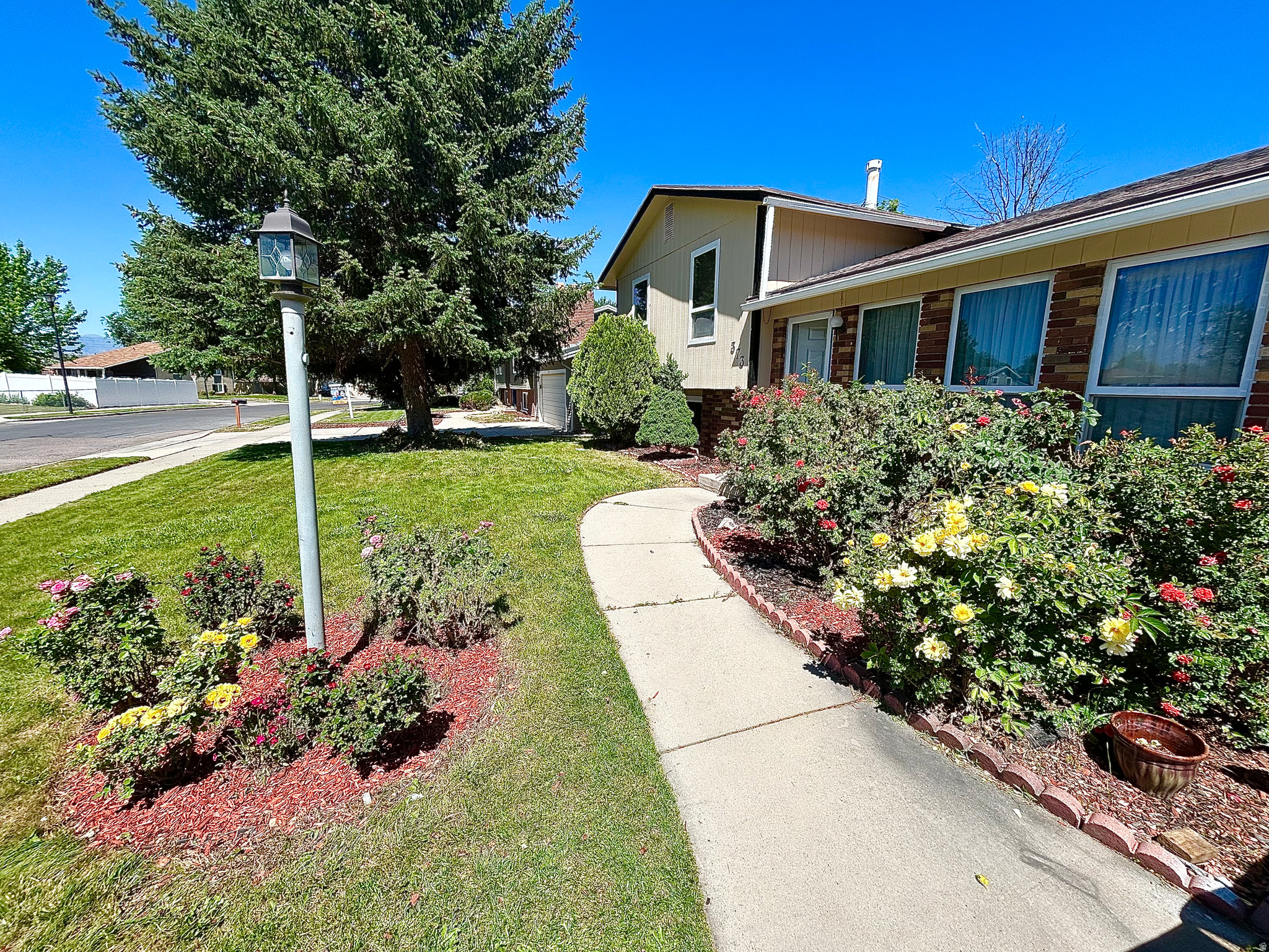Beautiful home in a Sandy neighborhood, close to I-15 access, main streets, shopping centers, public transportation, and a mall. Newer water heater and A/C. The backyard is a spectacular area with a gazebo, trees, and xeriscape garden, which reduces water consumption.  Square footage figures are provided as a courtesy estimate only and were obtained from County Records .  Buyer is advised to obtain an independent measurement.