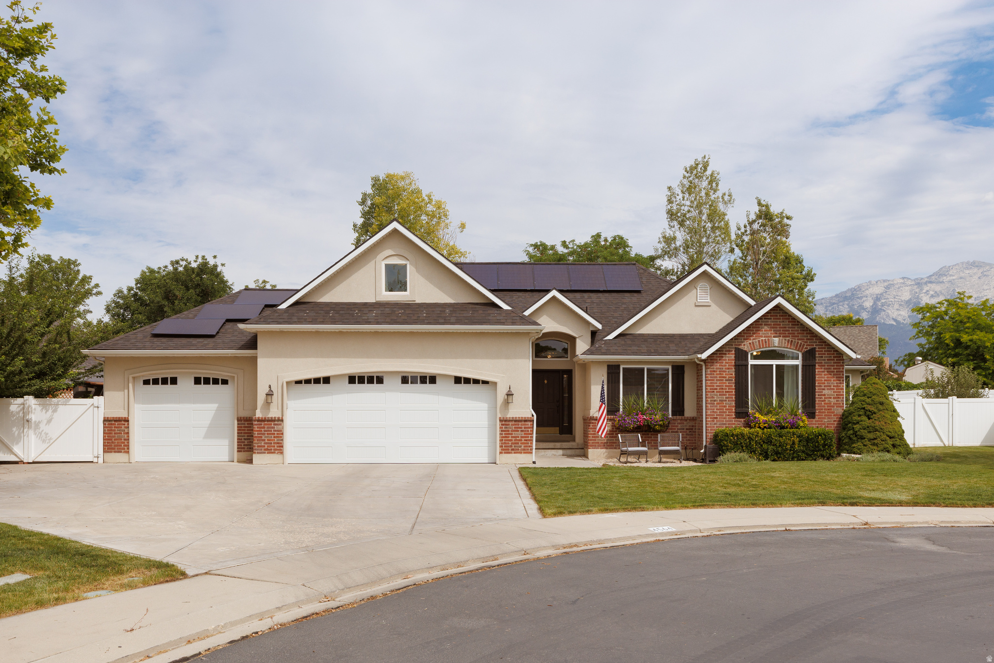 **OPEN HOUSE SAT. 7/18 - 10:00 AM - 2:00 PM** Welcome to this beautifully updated Cedar Hills rambler offering the perfect blend of modern efficiency, quality craftsmanship, and everyday comfort. Enjoy gorgeous mountain views and the convenience of rare main-level living-a highly sought-after feature that's hard to find. The spacious floor plan, 3-car garage, RV parking, and flexible living spaces make this home ideal for a variety of lifestyles.  Enjoy significant recent upgrades, including a new solar system with Tesla Battery and SPAN Smart Electrical Panel (2024), providing energy efficiency and smart-home convenience. Additional improvements include a new roof (2024), new stucco (2025), new energy-efficient windows (2025), and new garage doors (2025), giving you peace of mind for years to come.  Inside, you'll appreciate the warmth of hardwood floors, a cozy gas fireplace, stainless steel appliances, central vacuum, and a water softener. The main kitchen is stubbed for a gas range, making it easy to upgrade for those who prefer cooking with gas. The spacious floor plan includes an upstairs bonus room currently used as a home office that can also serve as an additional bedroom, plus a potential sixth bedroom that was included in the original builder's floor plan but is currently used as an extra-large storage room, offering exceptional flexibility for a growing family, guests, hobbies, or a home gym. The basement is also stubbed for a future kitchen, providing excellent potential for multigenerational living or additional entertaining space.  Step outside to your private backyard oasis featuring full automatic sprinklers, a garden area, an in-ground trampoline, and six mature fruit trees-including one plum, two pear, two peach, and one apple tree-creating the perfect space for entertaining, gardening, or simply enjoying the outdoors.  Perfectly situated for outdoor enthusiasts, this home is just minutes from three incredible parks, including Harvey Park, Sunset, and Heritage, with quick access to American Fork Canyon and the Murdock Canal Trail for hiking, biking, walking, and year-round recreation.  This thoughtfully updated home combines gorgeous mountain views, rare main-level living, energy-efficient upgrades, abundant storage, flexible living space, an unbeatable location, and outstanding outdoor features-all in one exceptional property. Don't miss the opportunity to make this incredible home yours!
