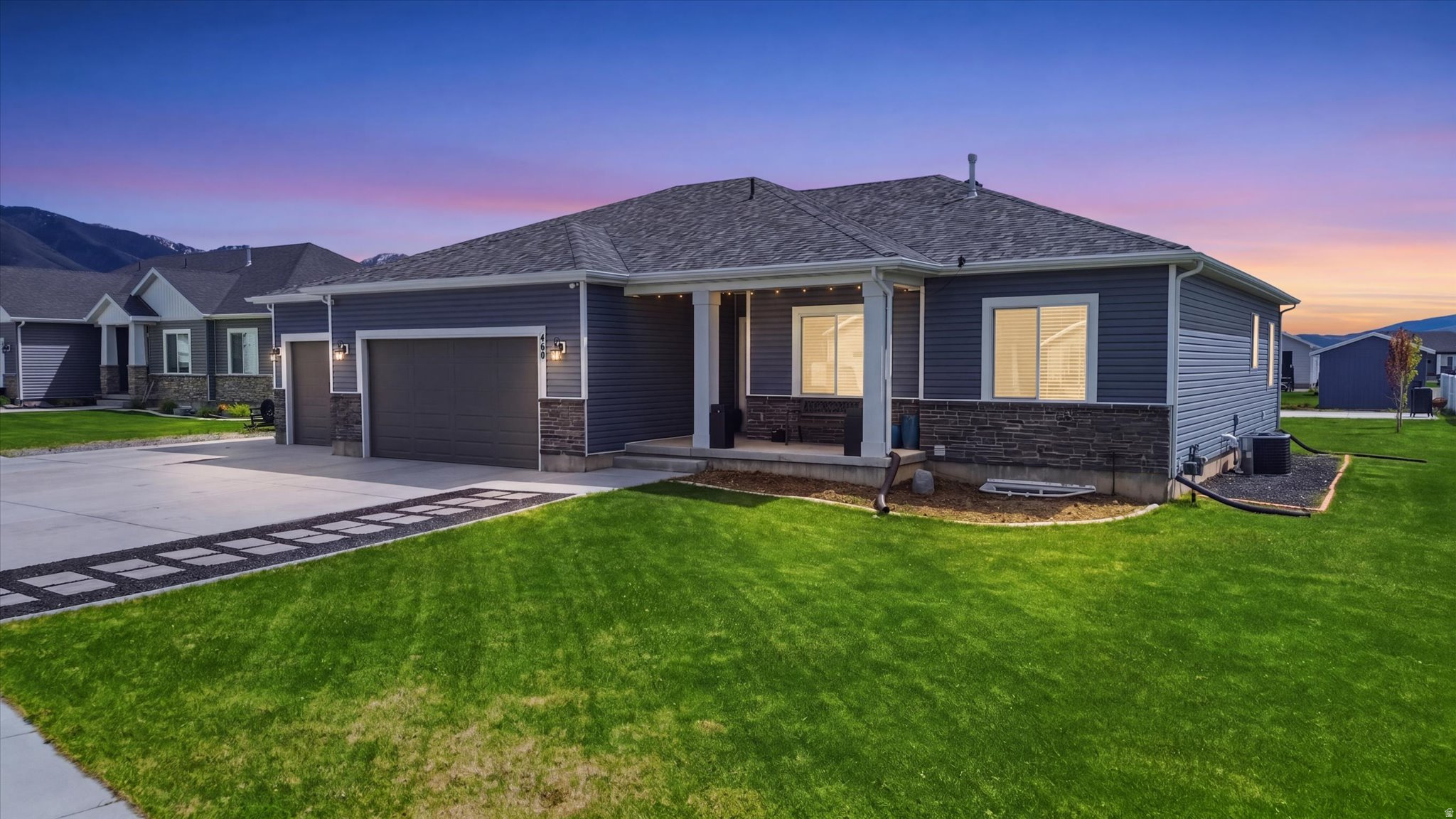 This 2020-built 5 bed, 3 bath home in Hyrum offers 3,440 sq ft of space on a flat .48-acre lot. The home features granite countertops, a spacious primary suite, and two large living rooms, along with a dedicated kids' playroom for added flexibility. The extra-large 4-car garage is perfect for vehicles, toys, storage, Gym or a workshop setup, while a large shed adds even more storage space. With a rare combination of square footage, functional layout, and lot size, this property offers plenty of room to make it your own.