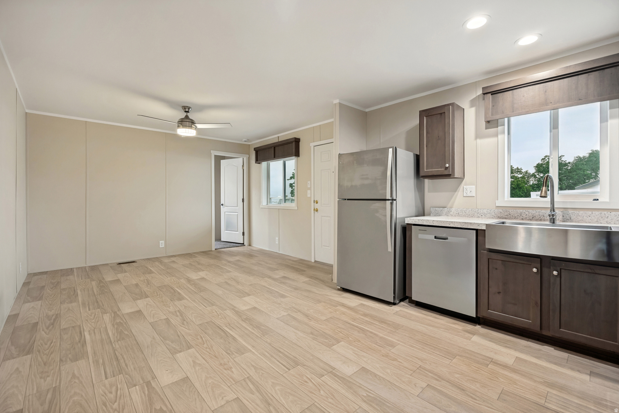 2024 Fleetwood 2-bedroom, 1-bathroom manufactured home offering 640 sq. ft. of comfortable living space. The open-concept living room and kitchen create a bright, inviting layout that's perfect for everyday living and entertaining. Located in the Rolling Hills Estates community in Layton, residents enjoy amenities including a pool, clubhouse, playground, shared RV parking, and more. This home includes a storage shed, central A/C, and all kitchen appliances (refrigerator, range, and dishwasher). Please note: This sale is for the manufactured home only. The land is not included, and buyers must be approved by the community before purchase.