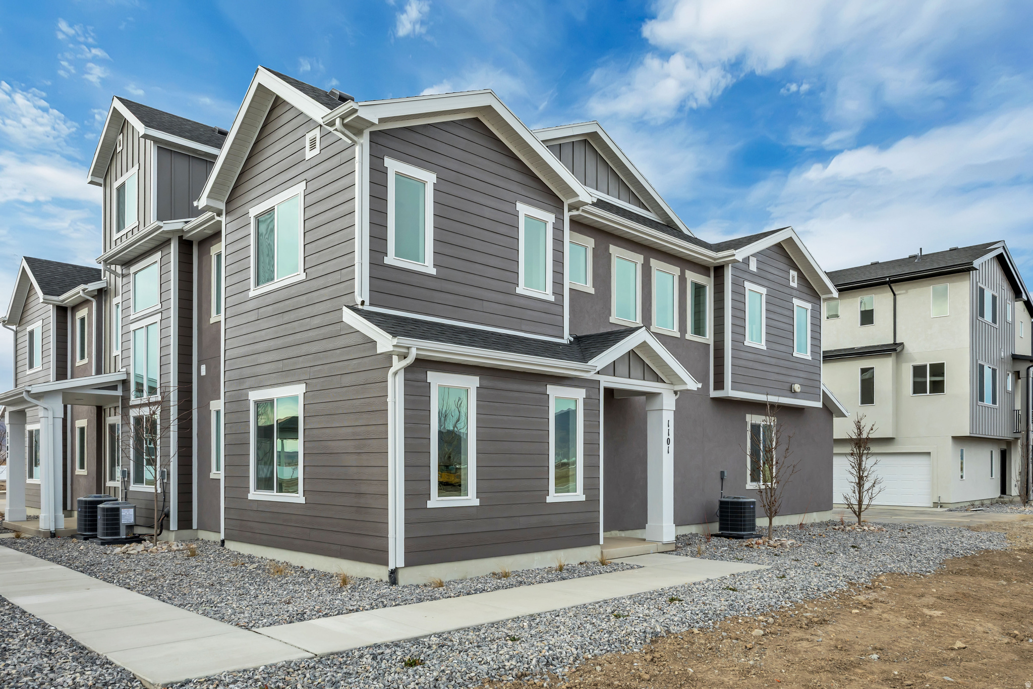 ***Contract on this home today and qualify for one of the 2 special financing options: Option 1: As low as 3.75% on an FHA 5/1 ARM, 3.99 % Conventional 7/6 ARM  OR Option 2: As low as 4.5% on a 30-year fixed FHA, 4.875% 30 year fixed Conventional, Restrictions apply: Contact us for more information. Experience modern comfort and style with the Buchanan townhome in the sought-after Harmony Place community in Salem. The kitchen is a chef's delight, featuring premium stainless steel gas appliances, quartz countertops, 42" upper cabinets, and stylish pendant lighting over the island. The spacious primary suite offers a dual-sink vanity with quartz countertop, a shower/tub combo, and a private door at the bath. Bath 2 is equally well-appointed with an undermount sink, quartz countertop, and a shower/tub combo, while the powder room features a classic pedestal sink. Enjoy 9' ceilings on the main floor, elegant railing on both levels, pre-plumbing for a future water softener, and an 8' garage door with keypad access for added convenience. Located in a vibrant community with parks, walking trails, and planned amenities, the Buchanan townhome offers both style and function in an ideal Salem location.