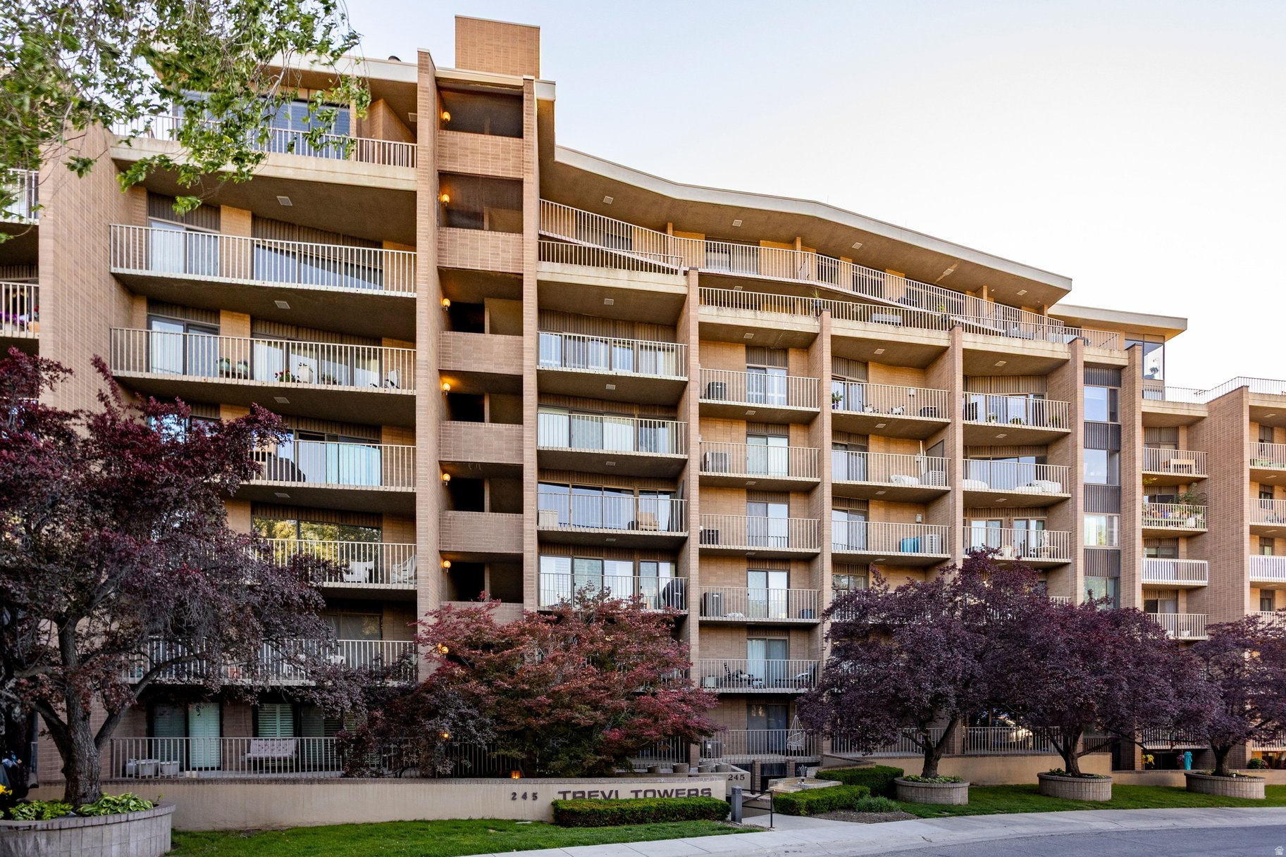 Rare opportunity to lease an exceptionally spacious 2-bedroom, 2-bathroom condo with breathtaking views of the Utah State Capitol, downtown Salt Lake City, and the Wasatch Mountains. Located on one of the upper floors of Trevi Towers, this expansive residence offers over 1,600 square feet of living space, significantly larger than most downtown condos, providing plenty of room to live, work, entertain, and relax. Recently updated with new hard-surface flooring throughout, the home features an open and airy floor plan, oversized rooms, abundant natural light, and incredible storage capacity rarely found in condominium living. Enjoy multiple private decks, including one overlooking the Capitol and another perfectly positioned to capture Salt Lake City's stunning sunsets and sparkling city lights. The bright and inviting living room features an electric fireplace and flows into a well-appointed kitchen with several newer appliances, built-in dining storage, and a large pantry closet. The oversized primary suite includes an ADA-compliant ensuite bathroom with a stand-up shower, while the large bonus room offers endless flexibility as a home office, hobby room, exercise space, or additional storage area, complete with an in-unit washer and dryer. Trevi Towers offers secure, controlled-access living with amenities including an indoor pool, hot tub, sauna, fitness center, reservable community room, two reserved underground parking spaces, and a private storage closet. Enjoy the convenience of a highly secure building, low-maintenance living, and unbeatable access to downtown dining, entertainment, and outdoor recreation, all while enjoying the comfort and space of a much larger home. No pets. No smoking. First and last month's rent, as well as a $2,800 security deposit, are required prior to moving in. Available for a 12-18 month+ lease only.                                                          UTILITIES: As part of the rental obligations, the resident will be responsible to pay: electricity, internet (after November 2026 High Speed Internet will be included), and premium cable TV/satellite (optional). The resident is also responsible for clearing snow from their deck. Water, sewer, trash, and basic cable TV are included. The resident is required to have an active Renter's Insurance Policy during the duration of the lease. NEIGHBORHOOD: Known by its fruit-inspired street names and vast array of classic architecture, the Marmalade District is conveniently located just north of downtown and west of Capitol Hill. This tiny sliver of Salt Lake is one of the oldest developed neighborhoods in the capitol city and includes hip restaurants, bars, mature landscaping, and even a new city library. The neighborhood is within walking distance to popular attractions such as City Creek Mall, Temple Square, the State Capitol, Downtown, and Memory Grove Park. APPLICATION: The application fee is $75. Each adult tenant must complete and submit an application. Application fees are nonrefundable. Applications must be submitted through our website (www.utah-rents.com). Applications submitted through third-party websites will not be considered. Applicants are judged on the same standards on a first-come/first-serve basis, one person or group at a time. The owner does not discriminate on the basis of race, color, religion, sex, national origin, disability, familial status, or source of income.