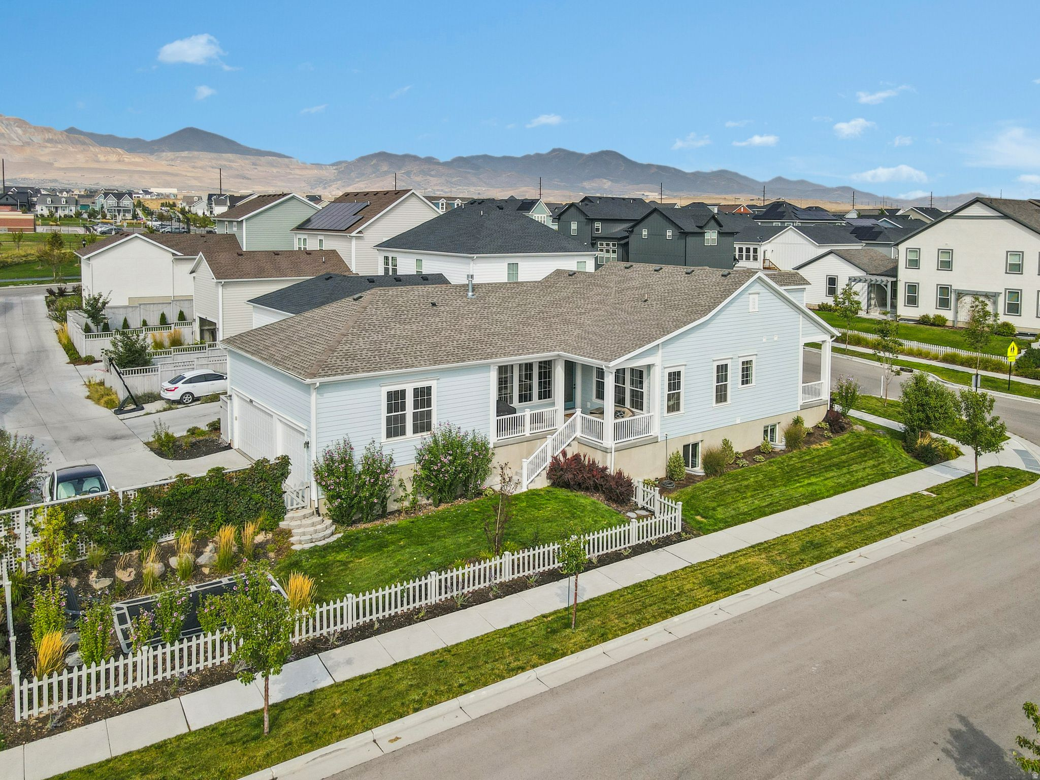 Be sure to check out the VIDEO TOUR! Welcome to this beautifully maintained home in Daybreak, the heart of South Jordan! Located in a desirable neighborhood, this property offers spacious living, modern finishes, and a layout designed for comfort and convenience. Step inside to find an inviting open concept floor plan with large windows that fill the home with natural light. The kitchen features solid surface countertops, ample cabinetry, and a generous island perfect for entertaining. On the main floor, the primary suite provides a peaceful retreat with a walk-in closet and a separate shower and tub. Additional bedrooms are bright and well-sized, making them ideal for family, guests, or a home office. The finished basement offers another kitchen and even more living space for a theater, gym, or play area. Enjoy outdoor living in the landscaped backyard with a patio, perfect for summer evenings and gatherings. Within walking distance of the new Ballpark in Downtown Daybreak, the Watercourse, schools, parks, and shopping, this home combines convenience with a strong, welcoming community atmosphere.