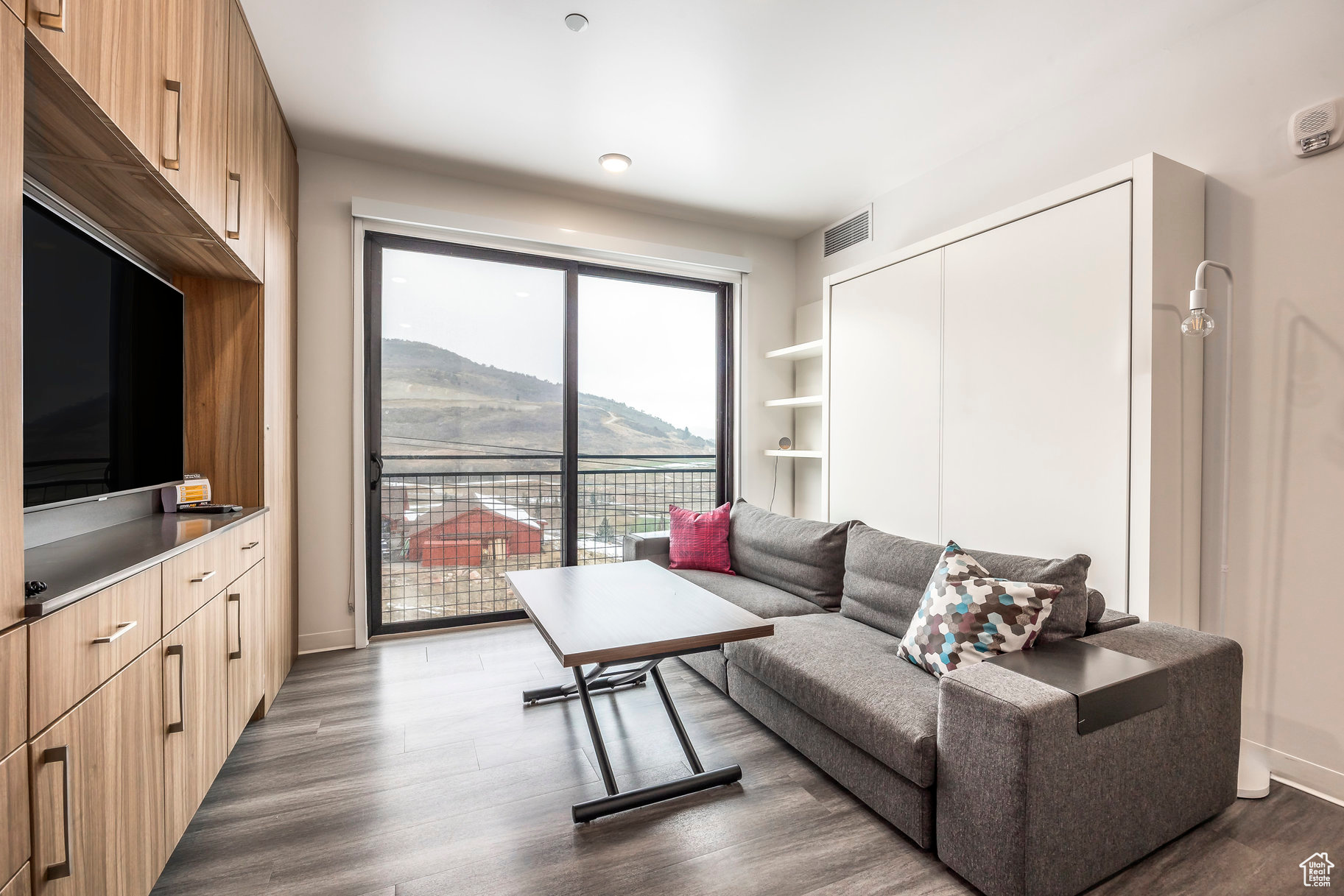 Nestled in the heart of Canyons Village, this chic YOTELPAD penthouse "Pad Plus" offers the epitome of modern mountain living-just steps from world-class skiing, dining, shopping, and aprs-ski fun. This fully furnished residence is a design-forward retreat, featuring Italian-made furnishings, sleek quartz countertops, high-end stainless steel appliances, and spacious 9-foot ceilings. Oversized windows fill the space with natural light, while clever Murphy beds maximize your living area without compromising comfort. Step out onto the Juliet-style balcony to take in sweeping views of the Canyons Resort ski lifts. As part of the exclusive YOTELPAD community, residents enjoy luxury amenities such as a fireside lounge, year-round pool and spa, game room, fitness center, steam room, express grocery store, valet parking, and dedicated ski valet service. Don't miss your chance to own this extraordinary property in one of Park City's most desirable locations.