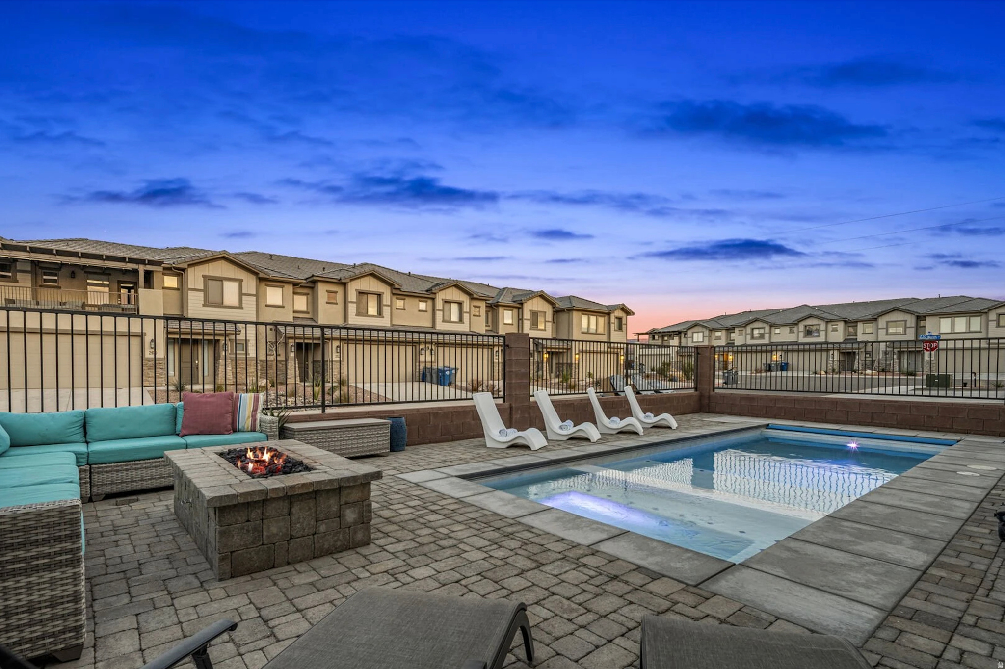 Luxury Turn-Key Vacation Townhome in Hurricane, Utah - Prime Investment Opportunity Discover this stunning 6-bedroom, 6-bathroom luxury townhome spanning over 3,400 sq ft in the heart of Hurricane, Utah. Perfectly positioned as a high-demand vacation rental, this property delivers exceptional comfort, style, and income potential with established future bookings already in place. The expansive layout features two spacious family rooms ideal for group gatherings, multiple living areas for relaxation, and seamless indoor-outdoor flow. Step outside to enjoy not one, but two covered patios--perfect for al fresco dining or unwinding under the stars--along with your own private pool and hot tub for exclusive enjoyment. Fully furnished and turn-key ready, this home comes equipped with everything needed to start generating revenue immediately. High-end finishes, modern amenities, and thoughtful design make it a favorite among guests seeking premium Southern Utah retreats. Residents and guests gain access to resort-style community amenities, including a clubhouse, state-of-the-art fitness center, expansive lazy river, large community pool, splash pad with slide, and more--creating an unparalleled resort experience right at home. Location is unbeatable: minutes from the thrilling Sand Hollow State Park sand dunes and crystal-clear Sand Hollow Lake for boating, ATV adventures, and beach days. Just 30 minutes from the iconic Zion National Park, this property offers easy access to world-class hiking, red rock scenery, and outdoor exploration that draws visitors year-round. Whether as a personal luxury getaway or a lucrative short-term rental investment, this rare 6-bed/6-bath townhome with private pool in a prime resort community won't last long. Embrace the ultimate Southern Utah lifestyle--where adventure meets relaxation. Contact for private showings or details on current rental performance. Your slice of paradise awaits!