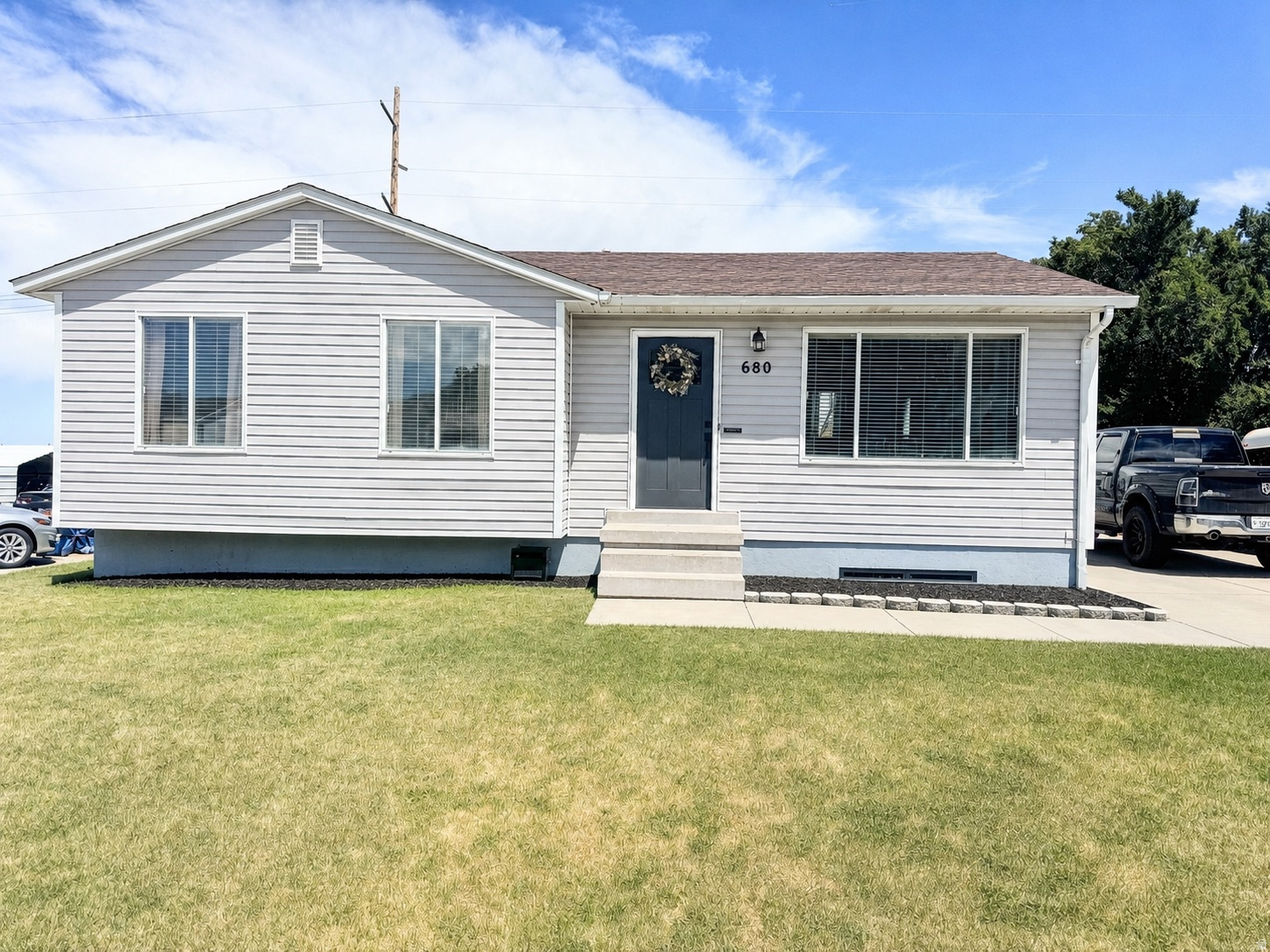 This charming 3-bedroom, 1-bath home offers a modern updated feel with an open-concept layout that creates a warm and inviting space perfect for families.  Enjoy new carpet throughout along with fully grassed front and back yards that provide plenty of room for kids, pets, and entertaining. The fully fenced backyard features a storage shed, vegetable garden area, mature shade tree, and a fire ring ready for family nights around the fire pit.  The basement is already framed and ready to be finished, giving buyers a great opportunity to build equity and create additional living space to fit their family's needs.  Recent updates include a new water heater installed in 2025 and a recent A/C tune-up for added peace of mind. New vinyl flooring throughout the home and new carpet in the bedrooms.   Conveniently located within walking distance to Sterling Elementary and a nearby park, this home is also just a short drive to Settlement Canyon Reservoir and surrounding outdoor recreation, giving you easy access to fishing, hiking, and nature right in your backyard. Plus, enjoy the convenience of being within commuting distance to Salt Lake City and the SLC International Airport.