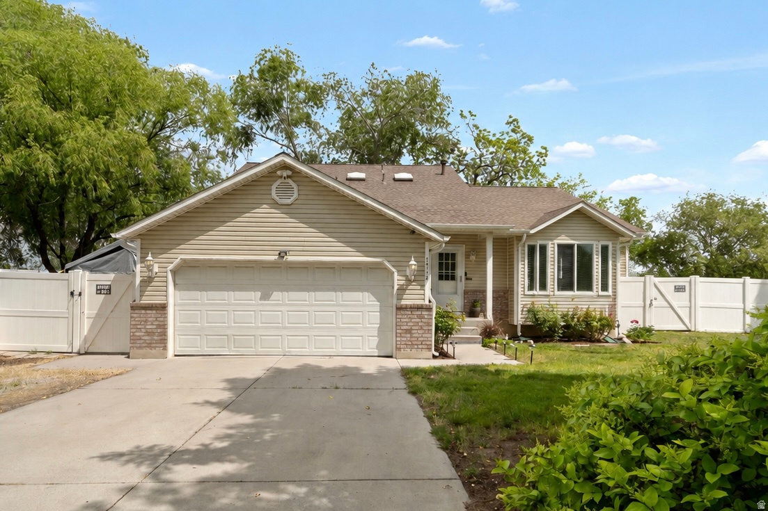 Welcome to this beautifully maintained West Jordan home, thoughtfully designed with family living in mind. Featuring four bedrooms, spacious living areas, and vaulted ceilings, this residence offers an open and inviting layout. The home has been lovingly cared for and updated to create a warm atmosphere, with major recent improvements providing true peace of mind. Updates include a remodeled kitchen, a new roof and gutters, a new AC unit and evaporator coil, a new water heater and water softener, updated windows, and new garage door motors. The primary suite offers a relaxing retreat complete with a large soaking tub and a walk-in closet. Outside, the property features mature landscaping, RV parking, and vinyl fencing. Located within walking distance of schools, shopping, and dining, this home offers exceptional value, comfort, and pride of ownership.