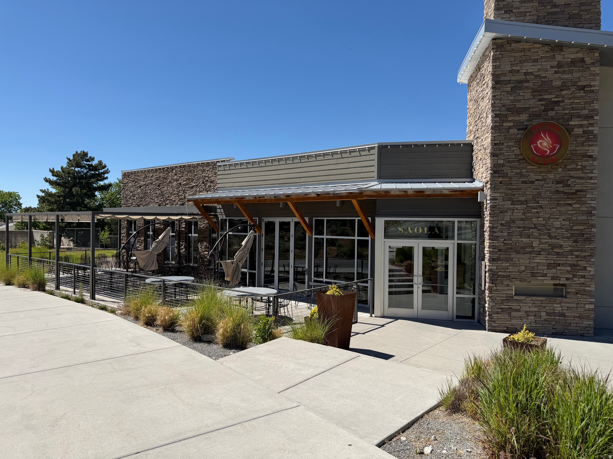An exceptional opportunity for an investor or owner-operator to acquire a premier freestanding restaurant in a thriving area of Cottonwood Heights, one of the Salt Lake Valley's most sought-after locations.  Ideally situated with convenient freeway access and just minutes from world-class ski resorts, including Snowbird, Alta, Solitude, and Brighton, the property benefits from strong visibility and a desirable demographic base. The restaurant is surrounded by a new luxury condo community, soon to be built luxury apartments and is within walking distance of a Marriott hotel, providing a steady flow of local and visiting clientele.  This beautifully appointed establishment features high-end finishes throughout, including custom marble-topped bars and tables, luxurious seating, a welcoming reception area, an elegant main dining room, private dining space, and inviting patio seating. Expansive windows fill the interior with natural light while showcasing breathtaking mountain views. Designed for efficiency and performance, the restaurant is fully turnkey and equipped with state-of-the-art commercial kitchen infrastructure, including premium walk-in refrigeration and freezer systems. A signature feature of the property is the custom-built sushi and oyster bar cases, designed by renowned craftsman Yoshimasa, complete with integrated refrigeration and custom refrigerated drawers to maintain optimal freshness.  Combining an outstanding location, exceptional build quality, and top-tier equipment, this property represents a rare opportunity in one of the area most desirable dining destinations.