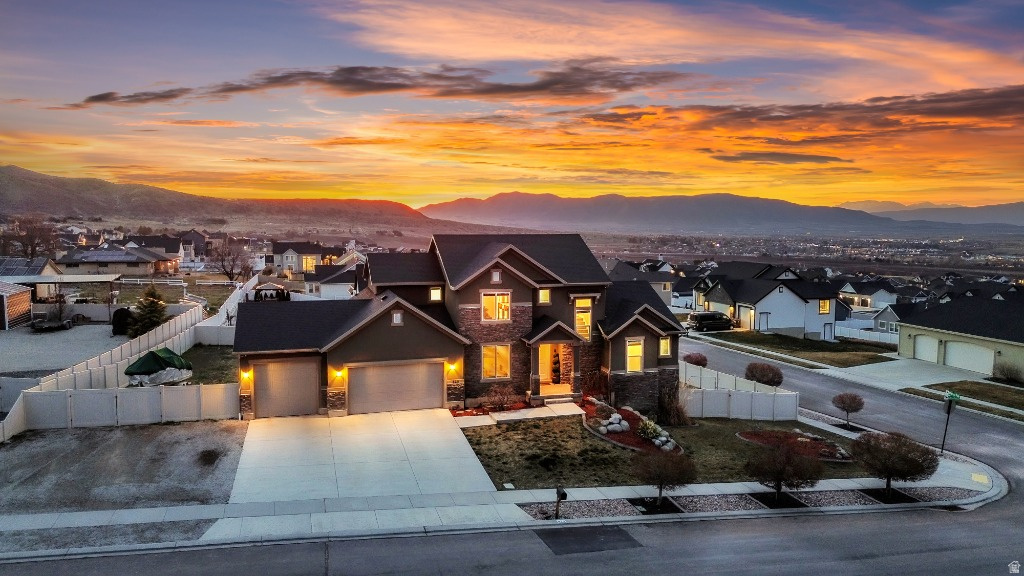3.125% interest rate assumable loan (if you qualify)! Corner-lot Elk Ridge home with stunning valley and Utah Lake views from every level and abundant natural light. Walk-out basement ADU-ready add kitchen cabinets. Basement appliances included with full-price offer. Quiet neighborhood with great neighbors.