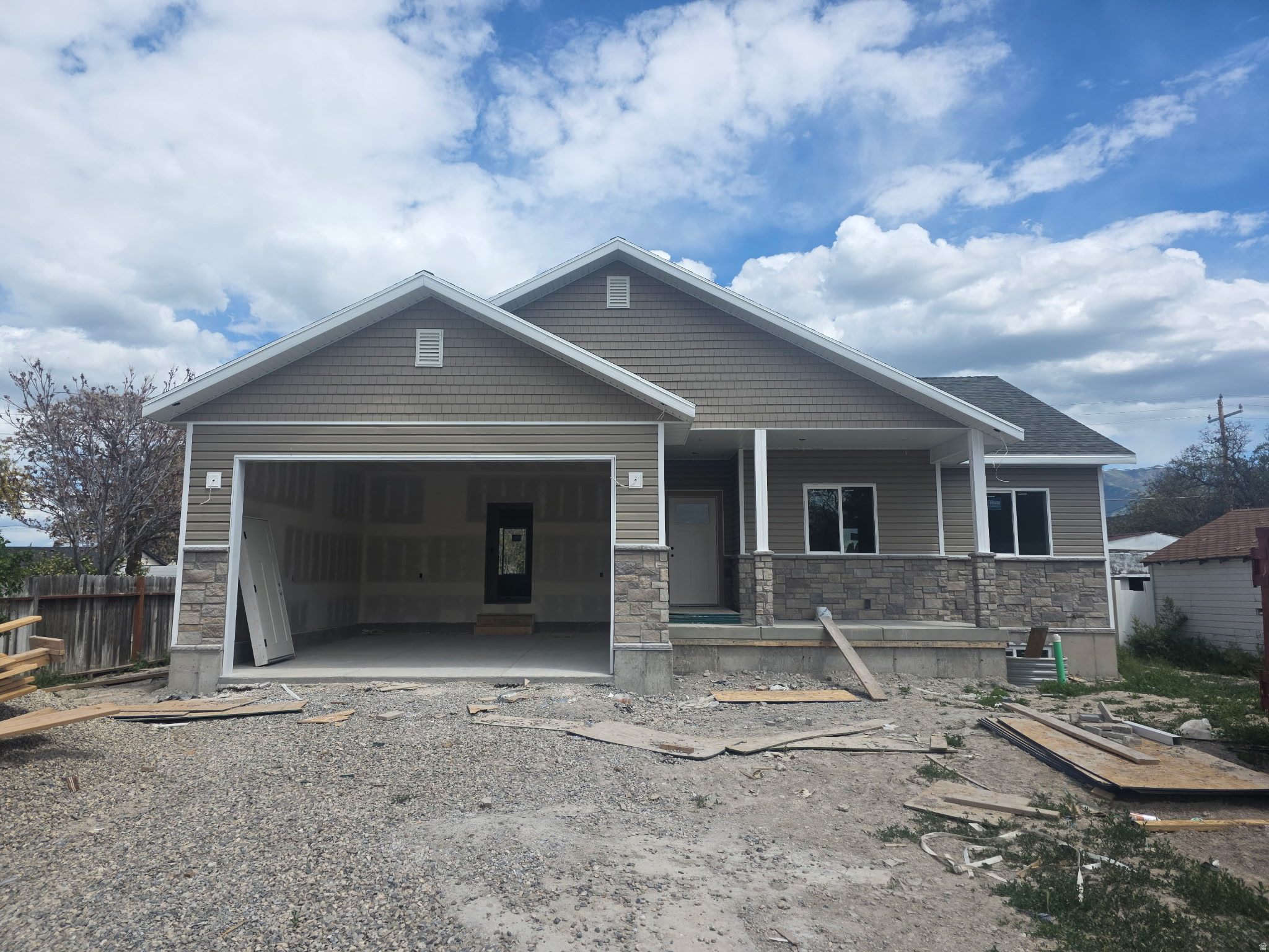 This inviting new build features a bright, open layout that connects the kitchen, dining, and living areas for easy everyday living. With three comfortable bedrooms, modern finishes, and a large backyard, the home is movein ready while still offering future potential. The unfinished basement provides plenty of room to grow, whether you envision extra bedrooms, a family room, or a hobby space down the road. Located within walking distance of the local elementary school, it's a convenient spot for families and anyone looking for a friendly, wellplaced neighborhood. A perfect blend of fresh construction, practical design, and longterm flexibility.