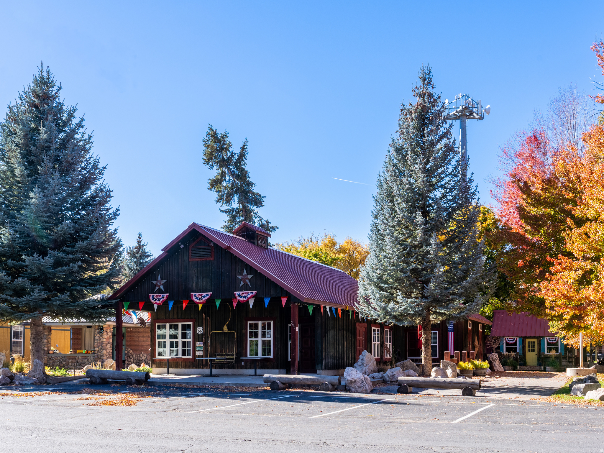 The Square is a rare mixed-use opportunity in the heart of Huntsville, Utah where Main Street visibility meets year-round mountain-town demand. Available as three distinct properties or as one complete transaction, this legacy package is zoned C-1, offering flexible use potential across multiple buildings and parcels-just minutes from the outdoor recreation Ogden Valley is known for, including Snowbasin, Pineview Reservoir, and endless hiking, biking, and alpine access. If your dream is to own a restaurant in a Rockwell-esque setting, pinch yourself-you found it! The 1,836 SF restaurant (MLS#2134565) includes a turnkey equipment package with prep sinks, a 6' x 6' walk-in refrigerator, an ice cream freezer, stainless steel prep tables, a 6-burner range with oven, a 48-inch charbroiler grill, and more. In a town where recreation isn't a season-it's the infrastructure-this location is positioned to serve a constant rotation of locals, visitors, and outdoor crews. Sold together, are the 1,456 SF commercial building, (MLS#2134567, currently leased to a long-term dental practice) 1,058 SF single-family home (MLS#2134566) featuring 2 beds and 1 bath on 0.02 acres, and the 966 SF event barn. All three share a large grassy common area adorned with charming sheds and small-town character-ideal for gatherings, weddings, and community events. Nearby, Gold Rush (MLS#2134564), zoned C-1, offers approximately 2,448 SF on 0.19 acres with flexible potential for retail, service, or mixed commercial use. This represents rare in-town commercial inventory with visibility and placement that's increasingly hard to replicate in Ogden Valley. Together, with historic character, a walkable setting, and a multi-building layout, The Square in Huntsville, UT is positioned for entrepreneurs and investors seeking a flagship footprint in the heart of the Wasatch. As Snowbasin ramps toward the 2034 Olympics and Powder Mountain continues its evolution, now is the time to secure a true Main Street position in one of Northern Utah's most recreation-driven ski-town communities.  *All property information, boundaries and documents to be verified by buyer.