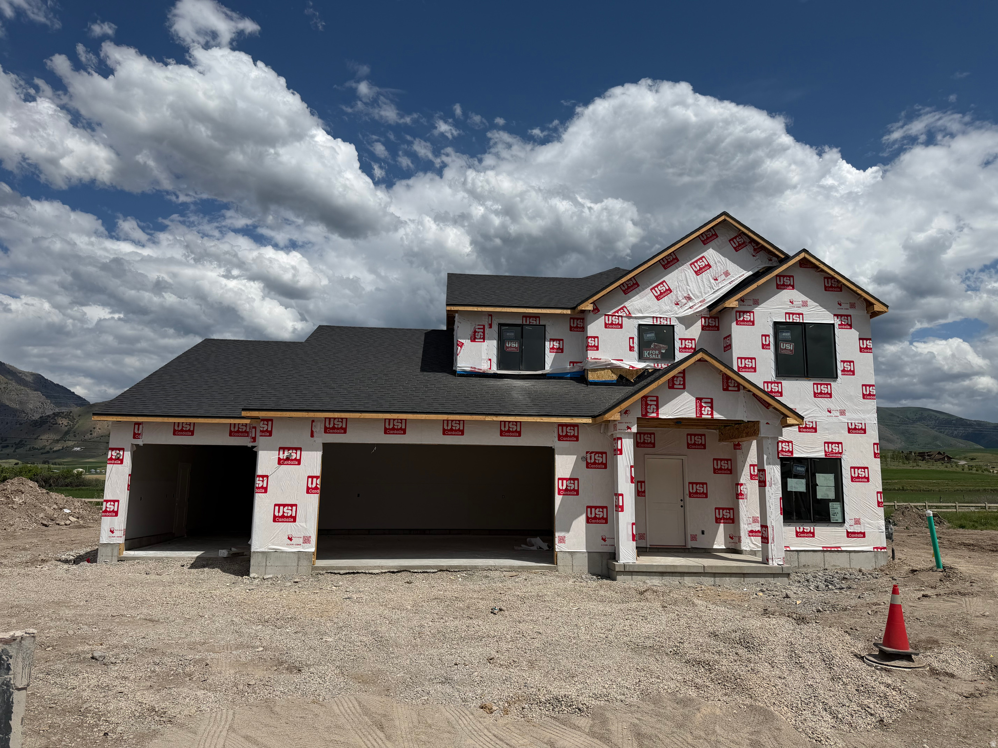 Come check out this beautiful NEW home and awesome community! Spacious 9ft ceilings on the main floor. Tons of big windows for lots of natural light. Amazing unobstructed views!  Gorgeous quartz countertops and quality soft close cabinets that go the ceiling. Open concept kitchen, dining, and great room area. Beautiful tile backsplash in kitchen.  Primary suite on the main floor! Upstairs you'll find four more bedrooms, a bonus room over the garage, and a big loft area. You'll love the view from your primary suite. Enjoy the soaker tub or the separate walk in shower and the big walk in closet. Laundry room downstairs. Four car garage for all the toys. You are going to love your new Kartchner home and will be impressed by the quality and attention to detail! Two year warranty! Square footage figures are provided as a courtesy estimate only and were obtained from sales brochure. Buyer is advised to obtain an independent measurement.