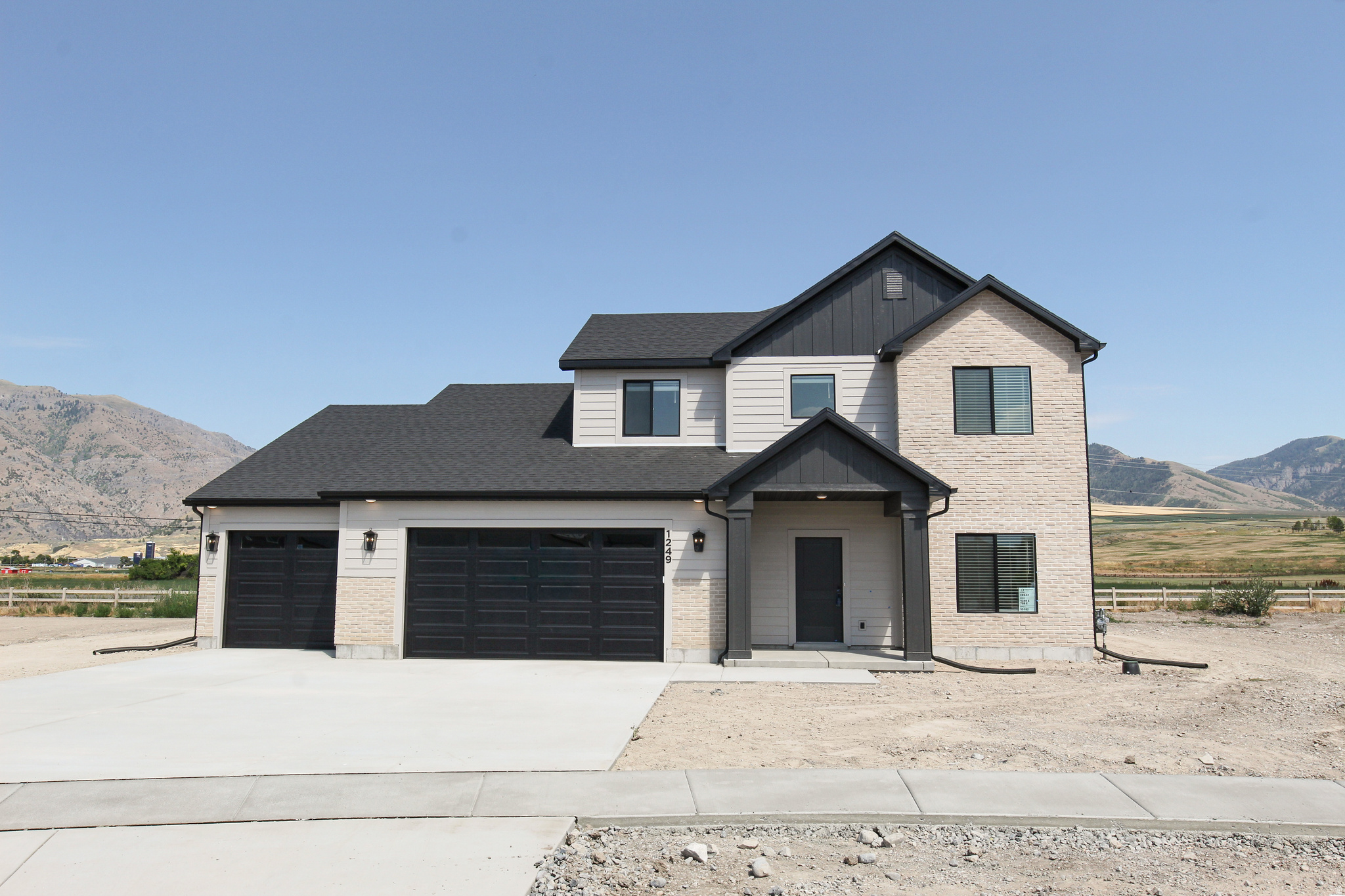 Come check out this beautiful NEW home and awesome community! Spacious 9ft ceilings on the main floor. Tons of big windows for lots of natural light. Amazing unobstructed views!  Gorgeous quartz countertops and quality soft close cabinets that go the ceiling. Open concept kitchen, dining, and great room area. Beautiful tile backsplash in kitchen.  Primary suite on the main floor! Upstairs you'll find four more bedrooms, a bonus room over the garage, and a big loft area. You'll love the view from your primary suite. Enjoy the soaker tub or the separate walk in shower and the big walk in closet. Laundry room downstairs. Four car garage for all the toys. You are going to love your new Kartchner home and will be impressed by the quality and attention to detail! Two year warranty! Square footage figures are provided as a courtesy estimate only and were obtained from sales brochure. Buyer is advised to obtain an independent measurement.