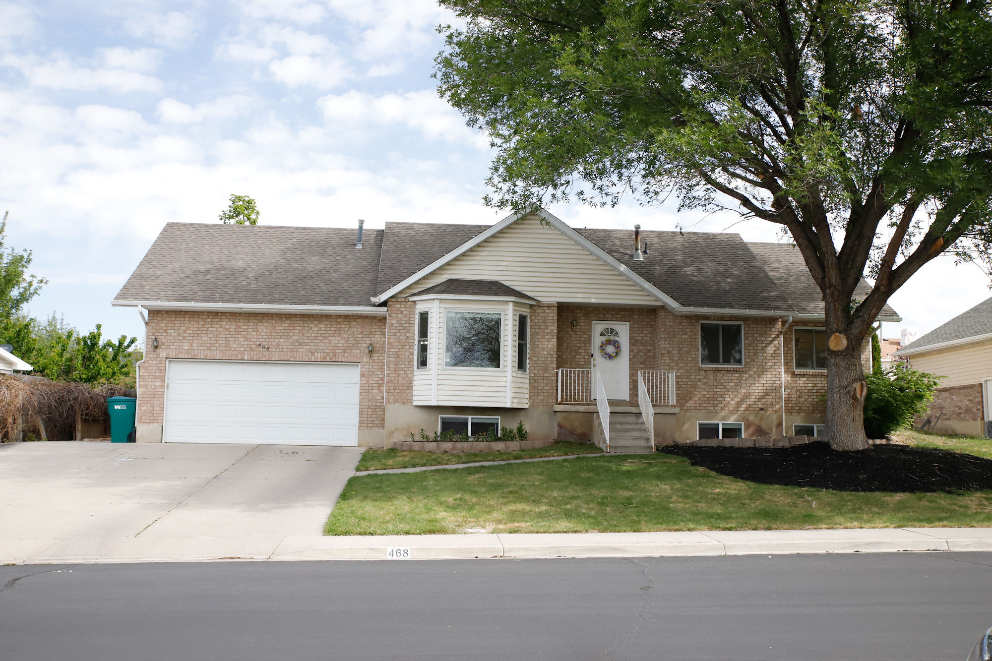 Here is a great home with six bedrooms, newer windows and new carpet. The HVAC system was replaced in 2020 with a high efficiency furnace, so between the new windows and furnace, the home stays cool or warm as you desire. The yard has a mix of mature trees, flowering trees and fruit trees. There is a raised garden bed section, too. The neighborhood is wonderful and adjacent to Centennial Park, it is also close to schools. The home is located a short walk, just around the corner, from the entrance to Centennial Park where there is a great asphalt track for running or letting the children ride their bikes or scooters. There is NO HOA in this neighborhood!  Don't miss out, come see for yourself the benefits this home and what the community has to offer.