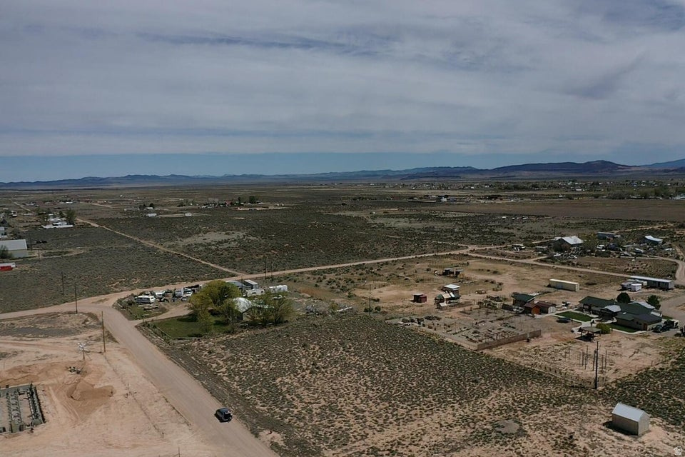 Rare opportunity to own a prime 1-acre lot in the highly sought-after Cedar Valley Acres! This expansive, level parcel offers the perfect canvas for your dream home or investment project. Positioned for ultimate convenience, the property is located on the same street as the Water Conservancy and features excellent access with power nearby. This is an incredible opportunity to build in a developing area; please note that water rights will need to be acquired and traded to the conservancy for a connection hook-up. Whether you're looking to build your custom estate or hold land in a growing community, this is a prime investment you don't want to miss.