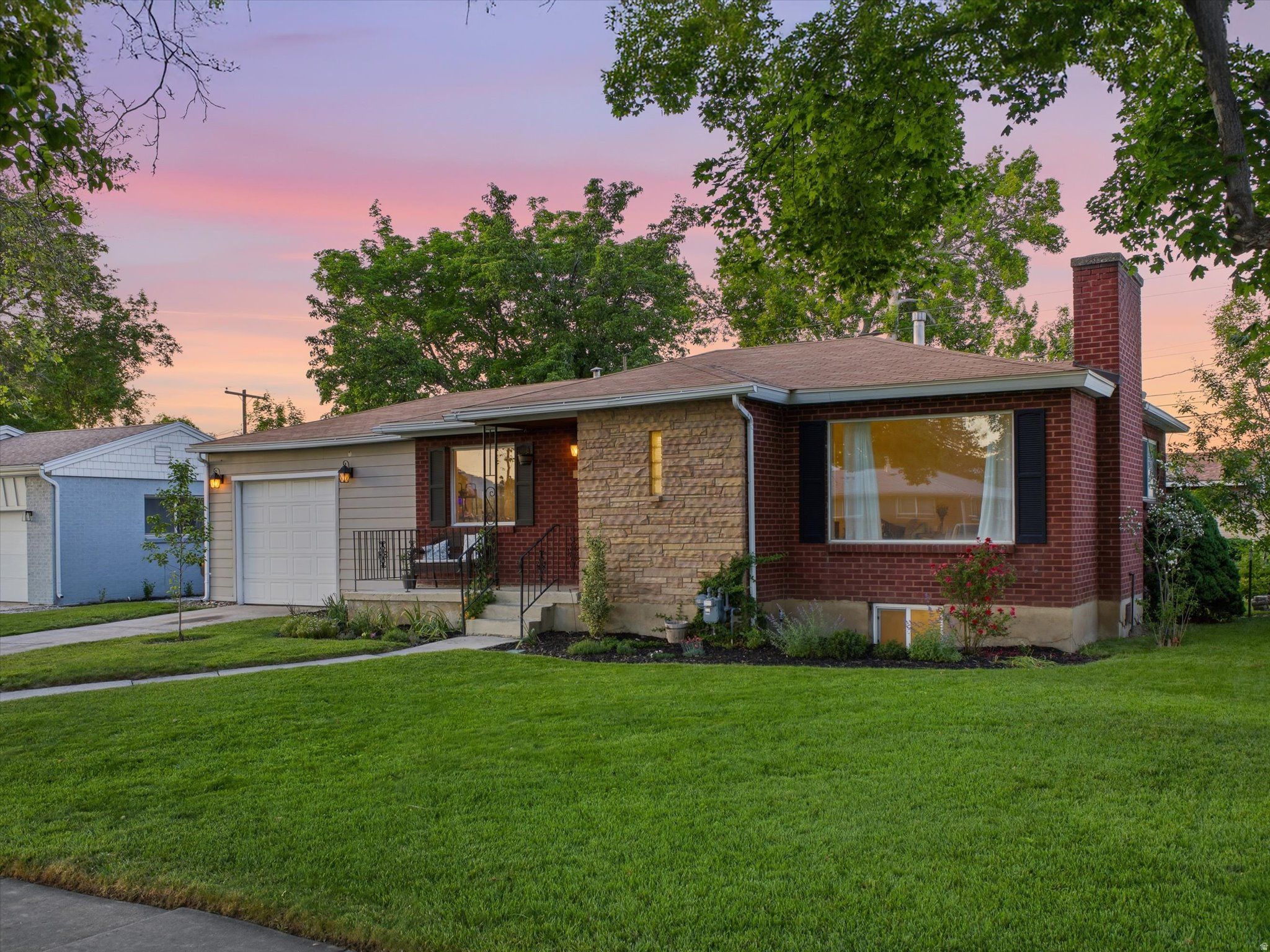 Say hello to 419 E Hillside Dr! This home happily offers 3 bedrooms, 2 bathrooms, and 1,736 square feet of comfortable living space on a spacious .18 acre lot. Located near Fashion Place Mall, Murray Amphitheater, spacious parks, ample dining, and quick freeway access, this home combines everyday convenience with a quiet welcoming neighborhood feel.  Once inside, you'll find thoughtful improvements and major system updates already completed for the next owner. Recent upgrades include a new garage foundation, basement windows replaced within the last 5 years, a new dishwasher, new water line to the home, and a new water heater! The furnace and A/C were both replaced in 2021, and this home also features a smart sprinkler system, along with Nest smart HVAC and door systems for added efficiency and safety.  It would be hard not to enjoy the large, beautifully maintained backyard perfect for entertaining, gardening, pets, or simply relaxing after a long day. With thoughtful updates and an unbeatable central location, this Murray home is ready for its next owner to move in and enjoy.