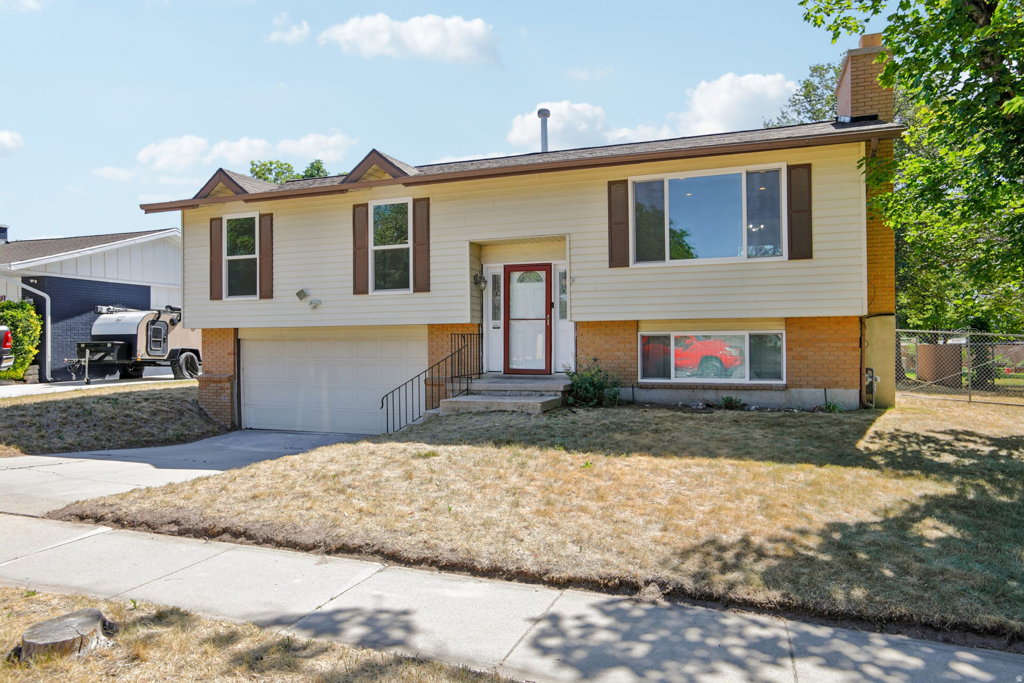 Imagine 6383 S Lauritzen Dr, recently refreshed with fresh interior throughout. This residence includes a comfortable fireplace and a kitchen equipped with ample counter space. The primary bedroom contains double closets for organized storage. This home, with its fresh updates and practical features, is ready for new enjoyment.. Included 100-Day Home Warranty with buyer activation