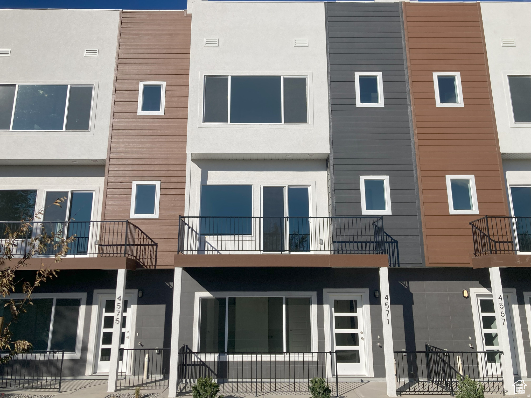 Last unit available! Step inside this stunning 4-story townhome at the Lofts on 35th and experience modern living at its finest. Designed with an open-concept layout, this home features a bright kitchen with quartz countertops, stainless steel appliances, and designer finishes that set the stage for both style and function. Upstairs, spacious bedrooms provide comfort and privacy, while the highlight of the home is the private rooftop deck-the perfect space to entertain, unwind, or soak in sweeping mountain and valley views. With an attached garage, sleek contemporary design, and easy access to I-215, shopping, dining, and parks, this home blends urban-inspired living with everyday convenience.