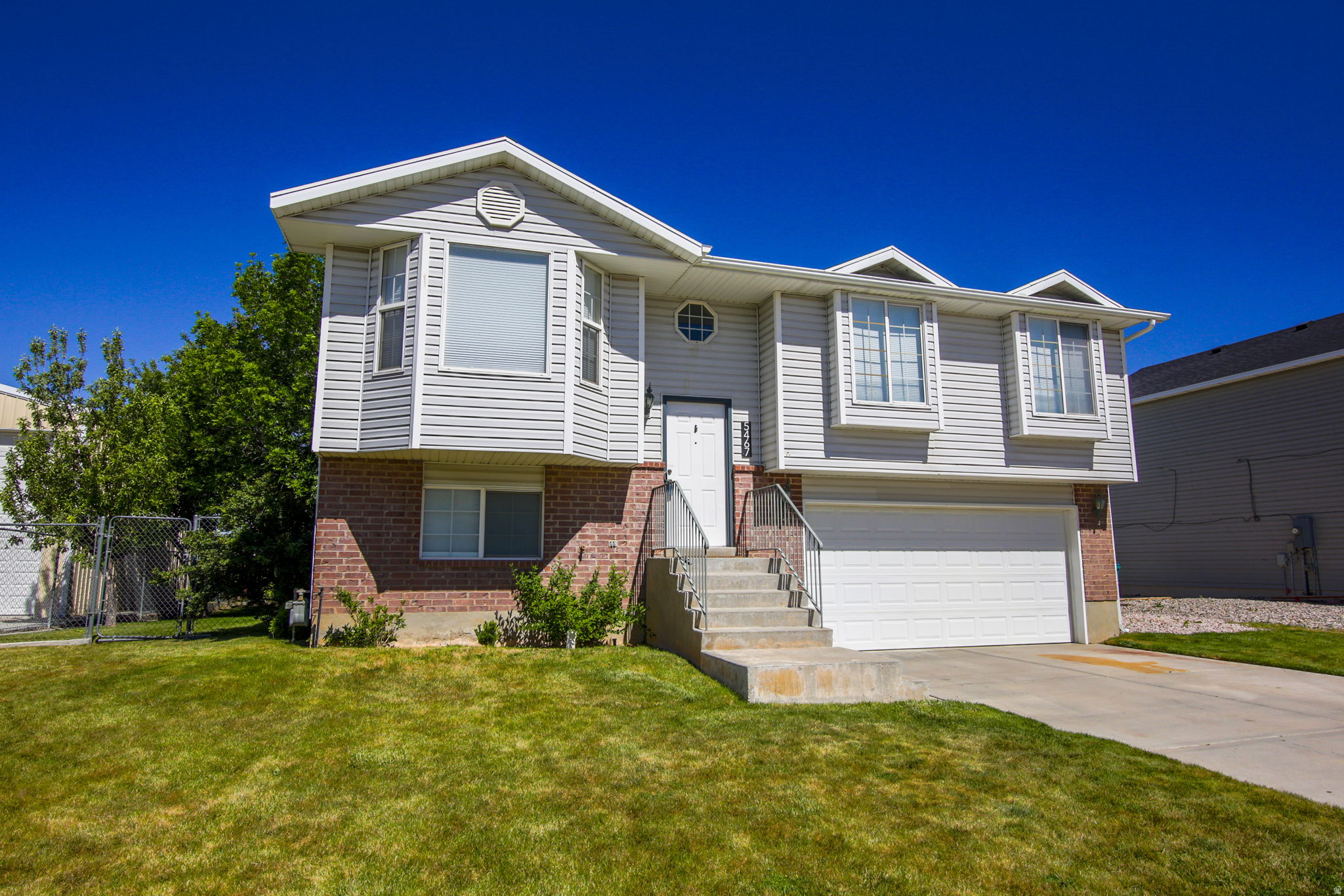 Wonderful home in Roy, Utah, located in a quiet neighborhood and close to schools. This home features several updates, including an updated kitchen with quartz countertops, tile flooring, recessed lighting, a new dishwasher, and a new microwave. New furnace installed 6/3/2026 . Enjoy a WiFi-enabled 4-zone sprinkler system, a shed with power, built-in storage shelving in the garage, RV parking, and a brand-new deck-perfect for outdoor living. All information provided as a courtesy. Buyer to verify all. Special Financing Incentives available on this property from SIRVA Mortgage