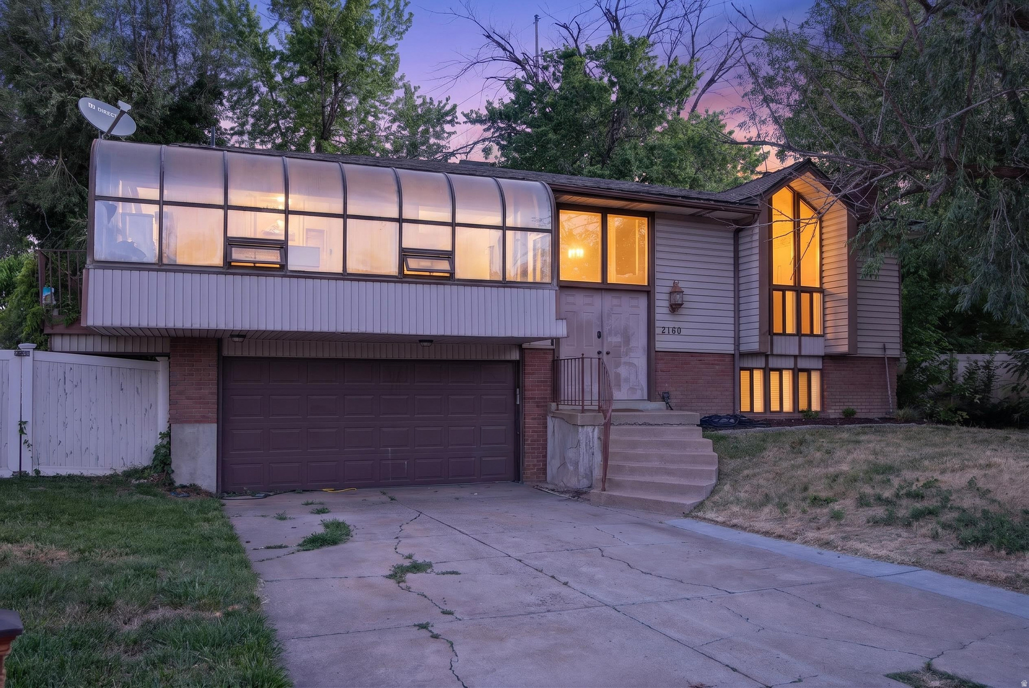 Great West Bountiful location with just minutes to I-15, Legacy Parkway and SLC. Enjoy the updated kitchen with white cabinets, stainless steel KitchenAid dishwasher and microwave. Pendant lights and cabinet hardware finish details. The walk-in pantry with prep countertop provides plenty of storage. The large dining area is great for entertaining family & friends. The atrium provides a great place to grow plant starts for a garden in the large backyard. Vaulted ceiling, fireplace and awesome wood finish details in the main floor family room give this home the details your looking for. Home automation features include the thermostat, door lock and doorbell. Owners suite with 3/4 bath, 2 car attached garage, and finished basement make this a home you don't want to miss.   Square footage figures are provided as a courtesy estimate only and were obtained from county records.  Buyer is advised to obtain an independent measurement.